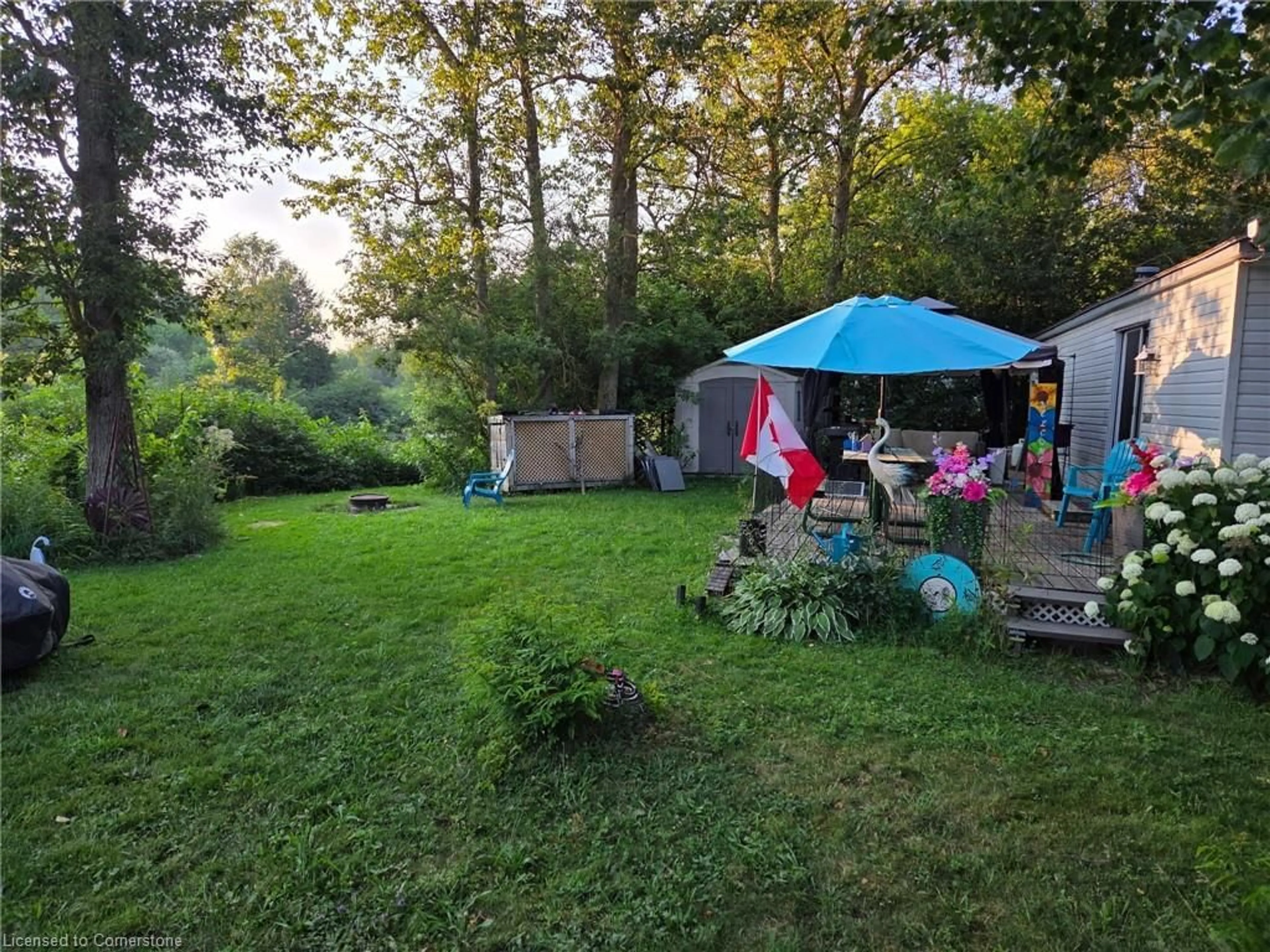 Patio, forest/trees view for 7489 Sideroad 5 E #Edgewater E14, Mount Forest Ontario N0G 2L0