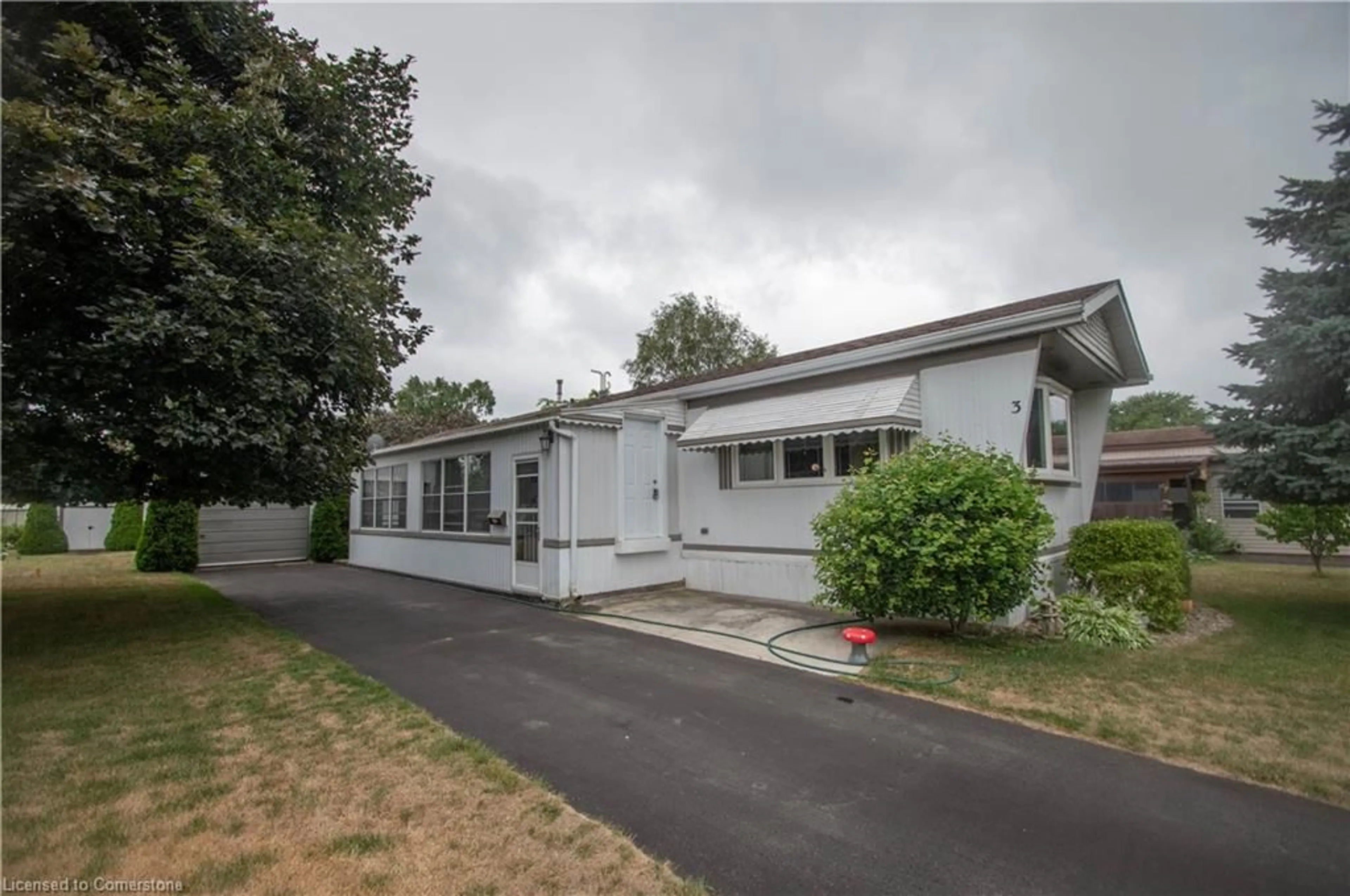 Home with vinyl exterior material, street for 3 Fifth St, Delhi Ontario N4B 2W6