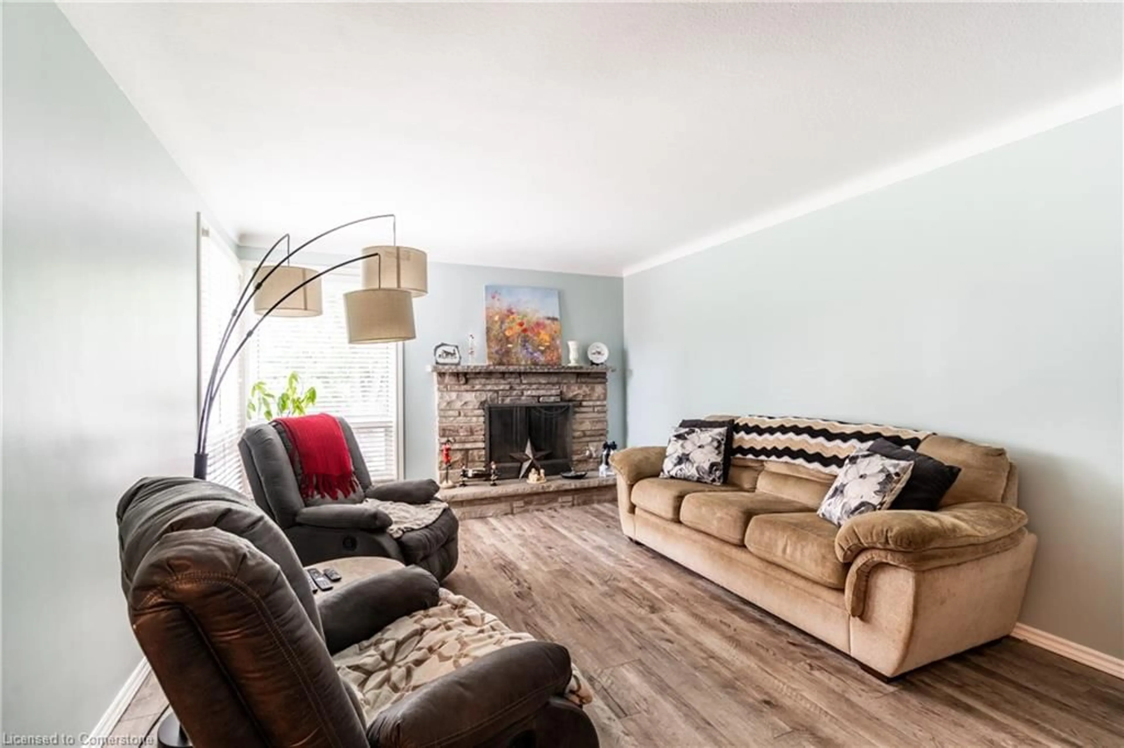Living room with furniture, wood/laminate floor for 12 Viking Dr, St. Catharines Ontario L2M 2V3