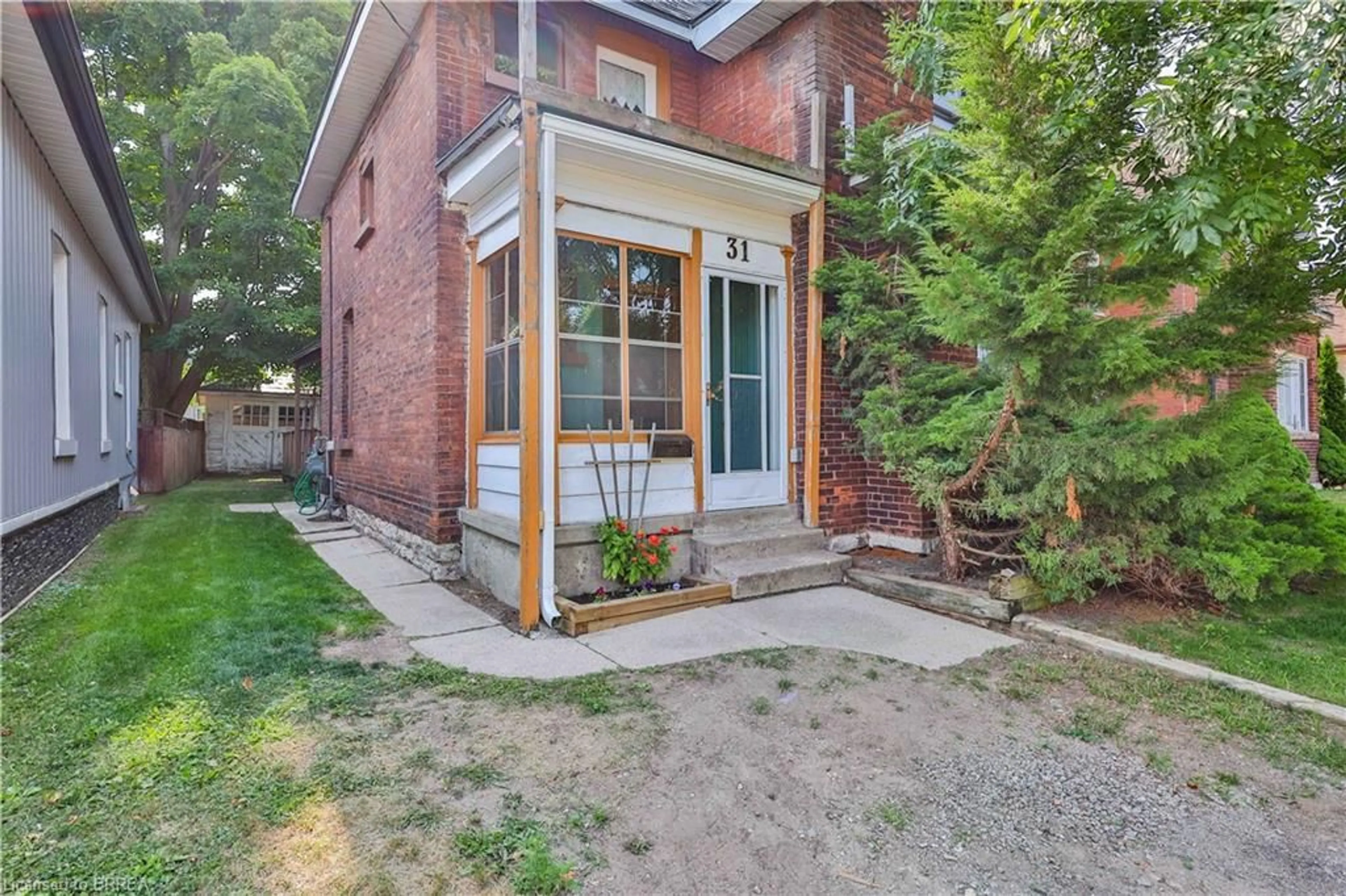 Home with brick exterior material, street for 31 Fair Ave, Brantford Ontario N3S 2M4