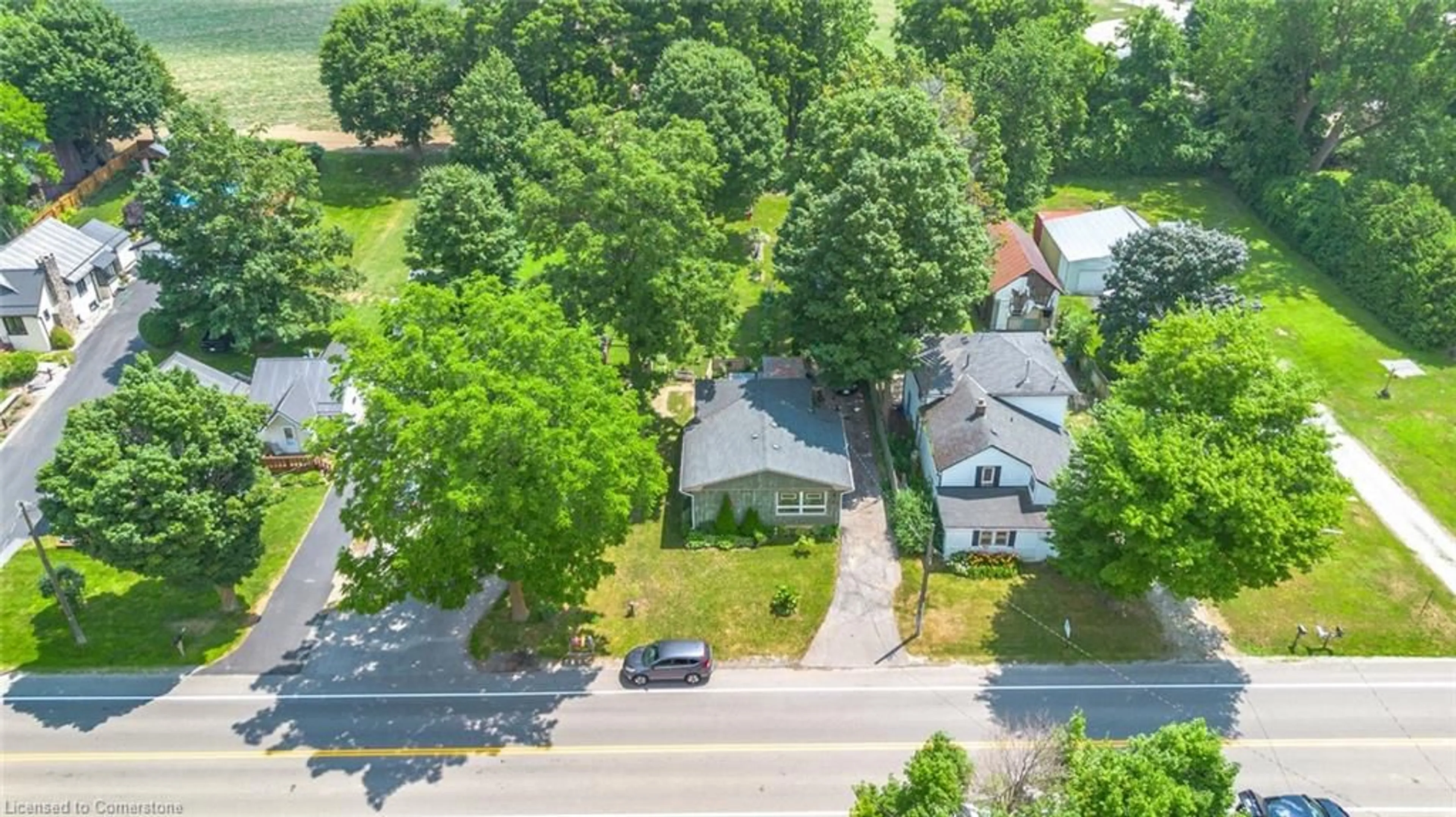 A pic from outside/outdoor area/front of a property/back of a property/a pic from drone, street for 252 Regional Road 24, Bloomsburg Ontario N0E 1Y0