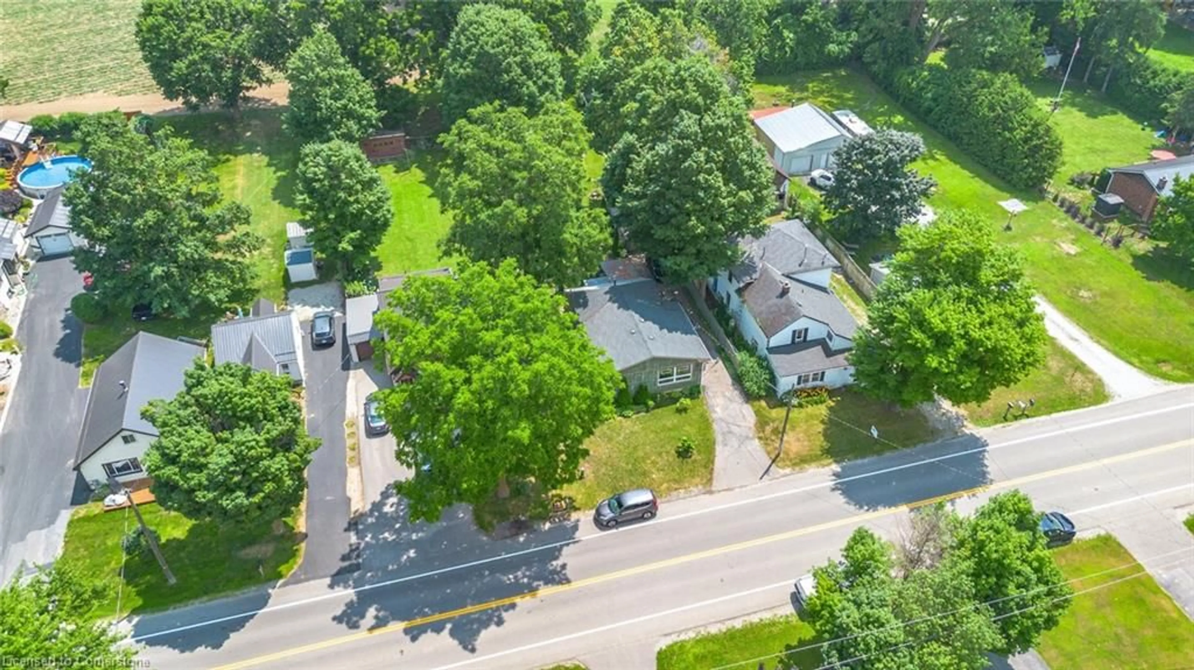 A pic from outside/outdoor area/front of a property/back of a property/a pic from drone, street for 252 Regional Road 24, Bloomsburg Ontario N0E 1Y0