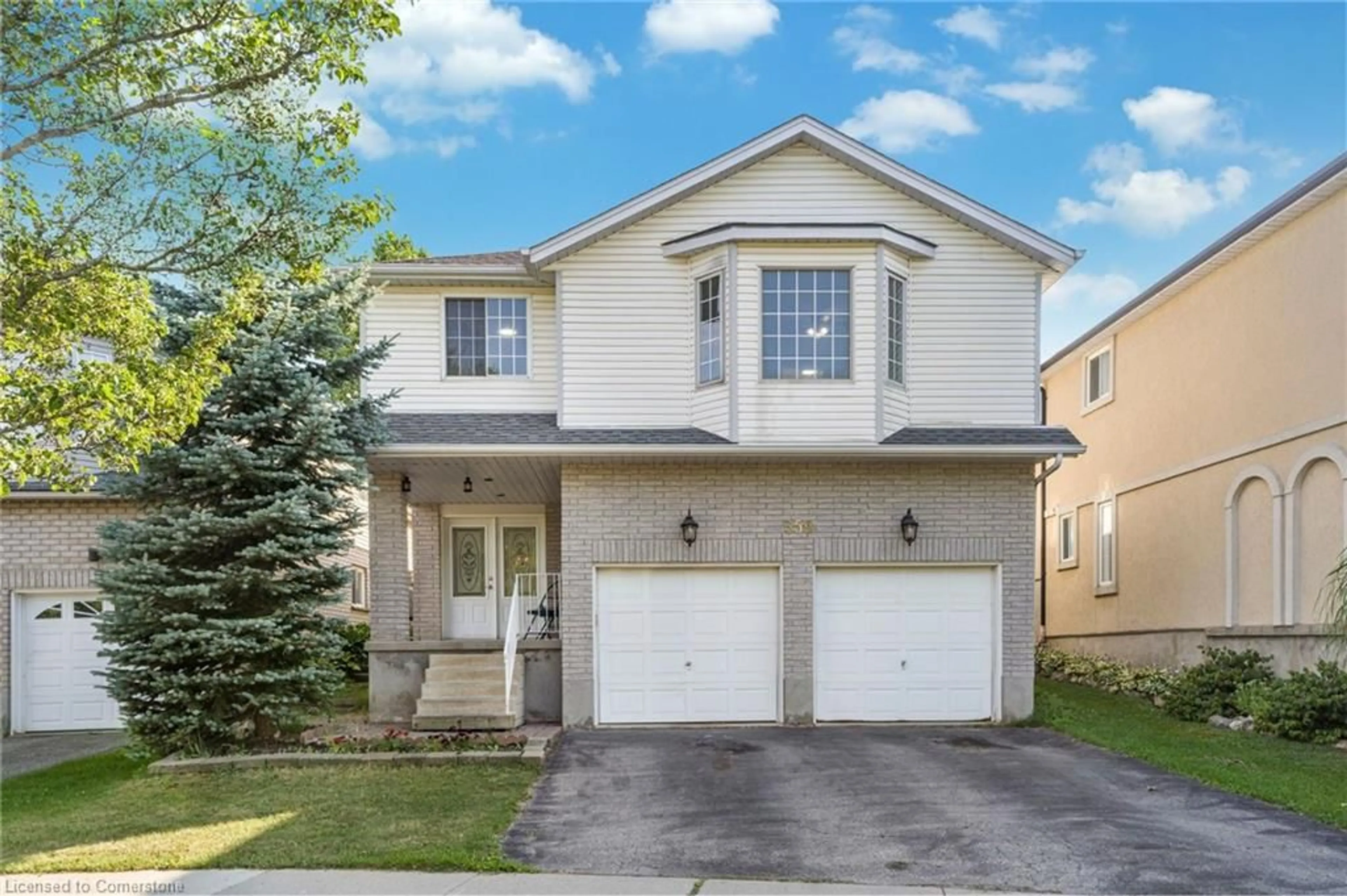 Home with vinyl exterior material, street for 359 Otterbein Rd, Kitchener Ontario N2B 3V9