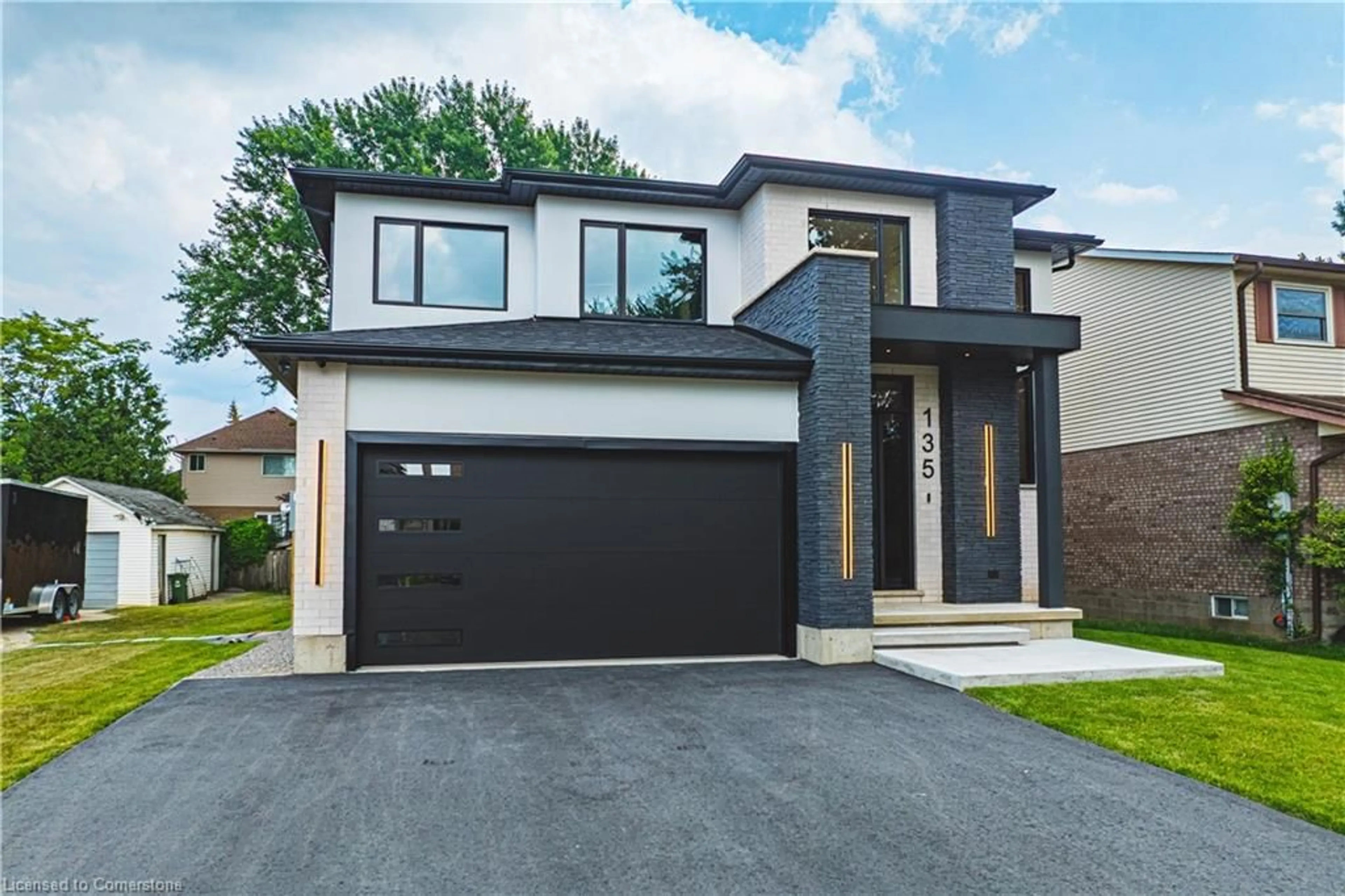 Home with brick exterior material, street for 135 Eleanor Ave, Hamilton Ontario L8W 1C7