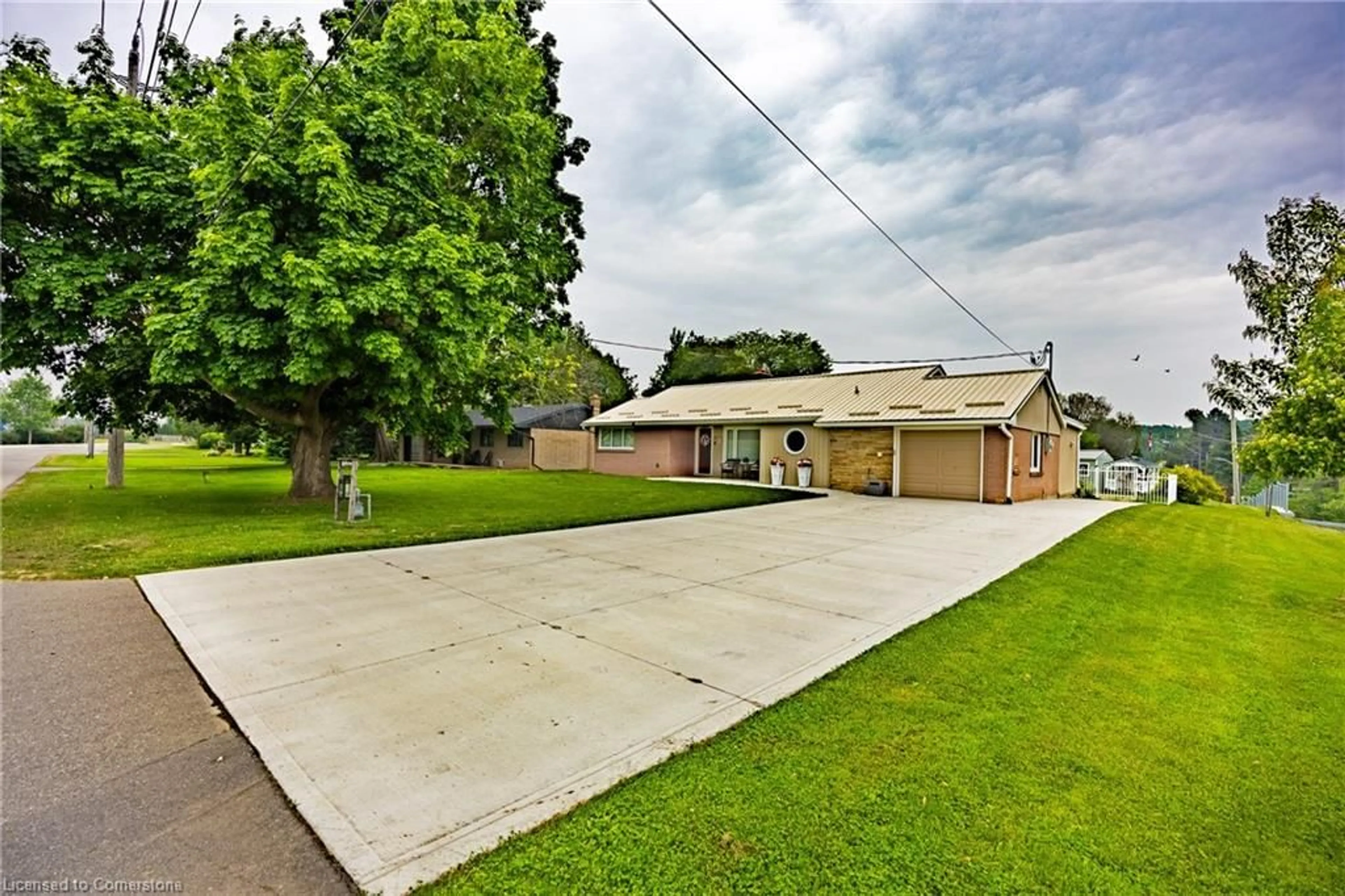 A pic from outside/outdoor area/front of a property/back of a property/a pic from drone, street for 6 Ryerse Cres, Port Dover Ontario N0A 1N6