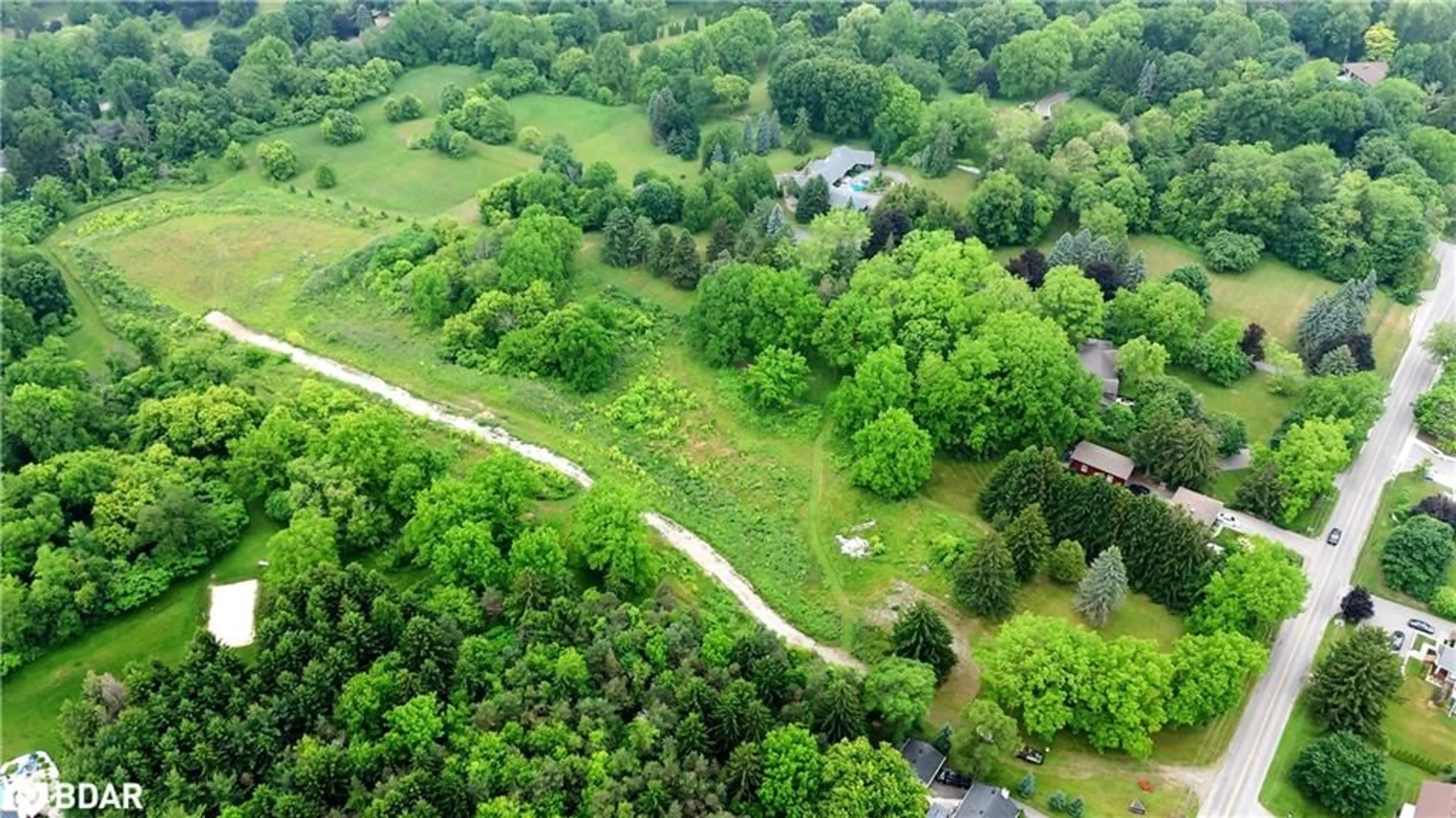 A pic from outside/outdoor area/front of a property/back of a property/a pic from drone, forest/trees view for 610-612-614 Harvest Rd, Flamborough Ontario L9H 5K7