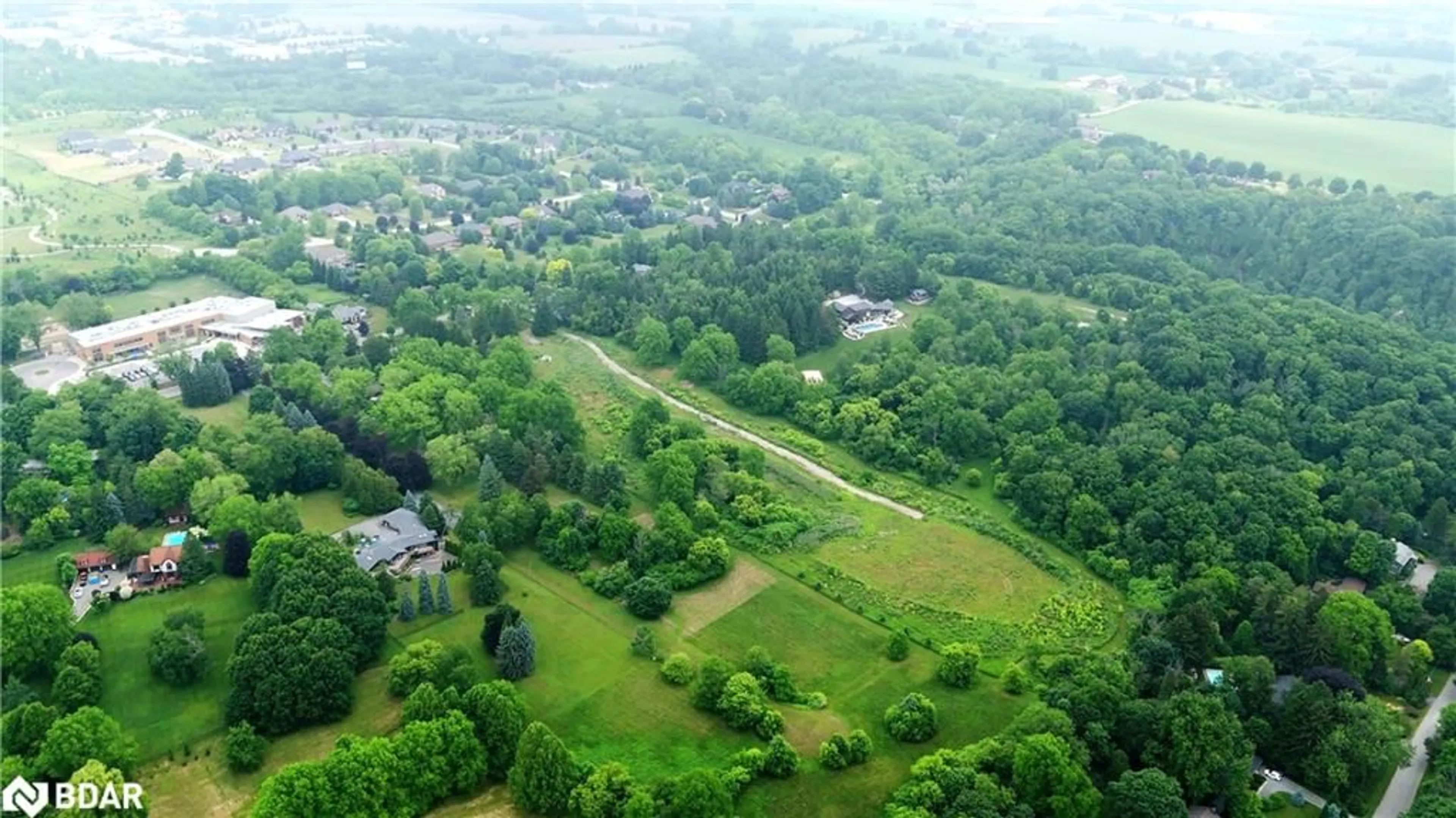 A pic from outside/outdoor area/front of a property/back of a property/a pic from drone, mountain view for 610-612-614 Harvest Rd, Flamborough Ontario L9H 5K7