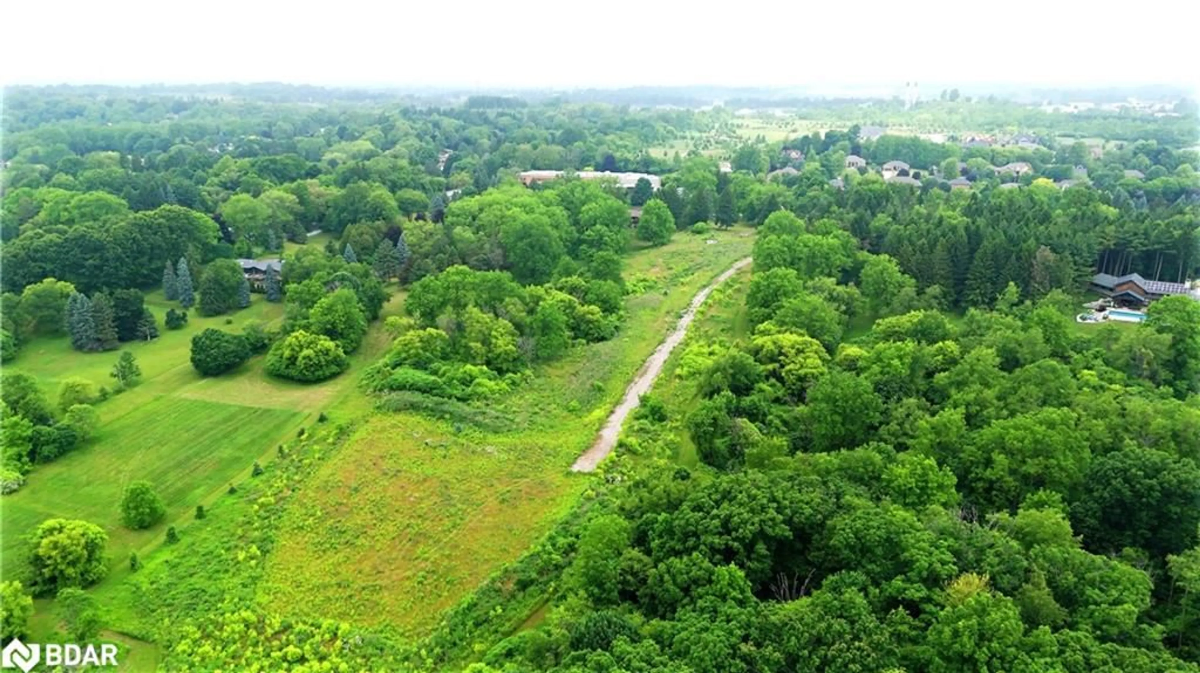 A pic from outside/outdoor area/front of a property/back of a property/a pic from drone, forest/trees view for 610-612-614 Harvest Rd, Flamborough Ontario L9H 5K7