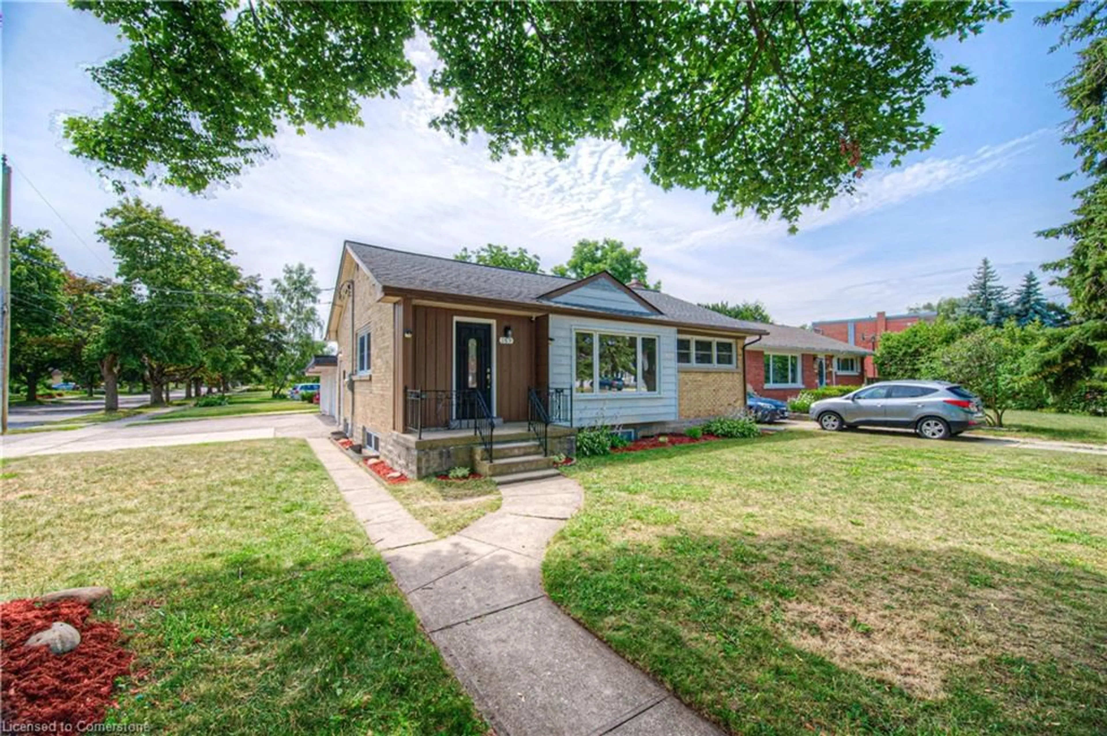 Home with brick exterior material, street for 169 Bruce St, Kitchener Ontario N2B 1Z2