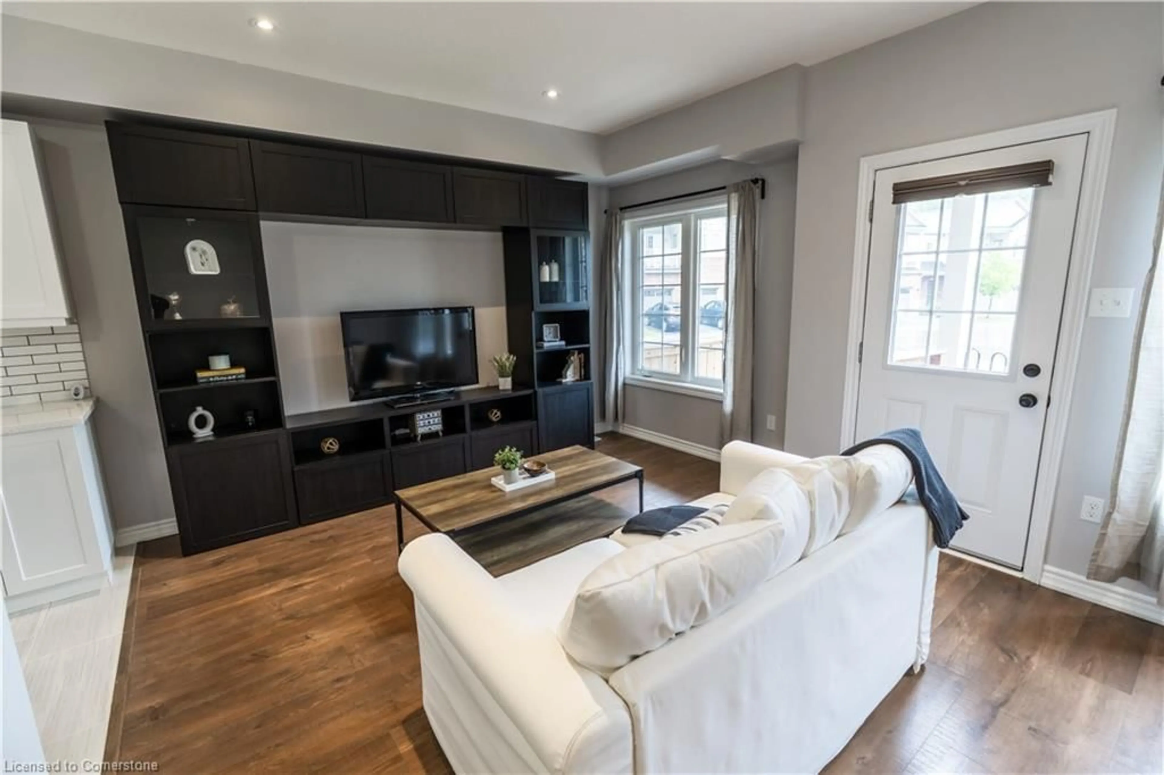 Living room with furniture, wood/laminate floor for 403 Westwood Dr #30, Kitchener Ontario N2M 0B5