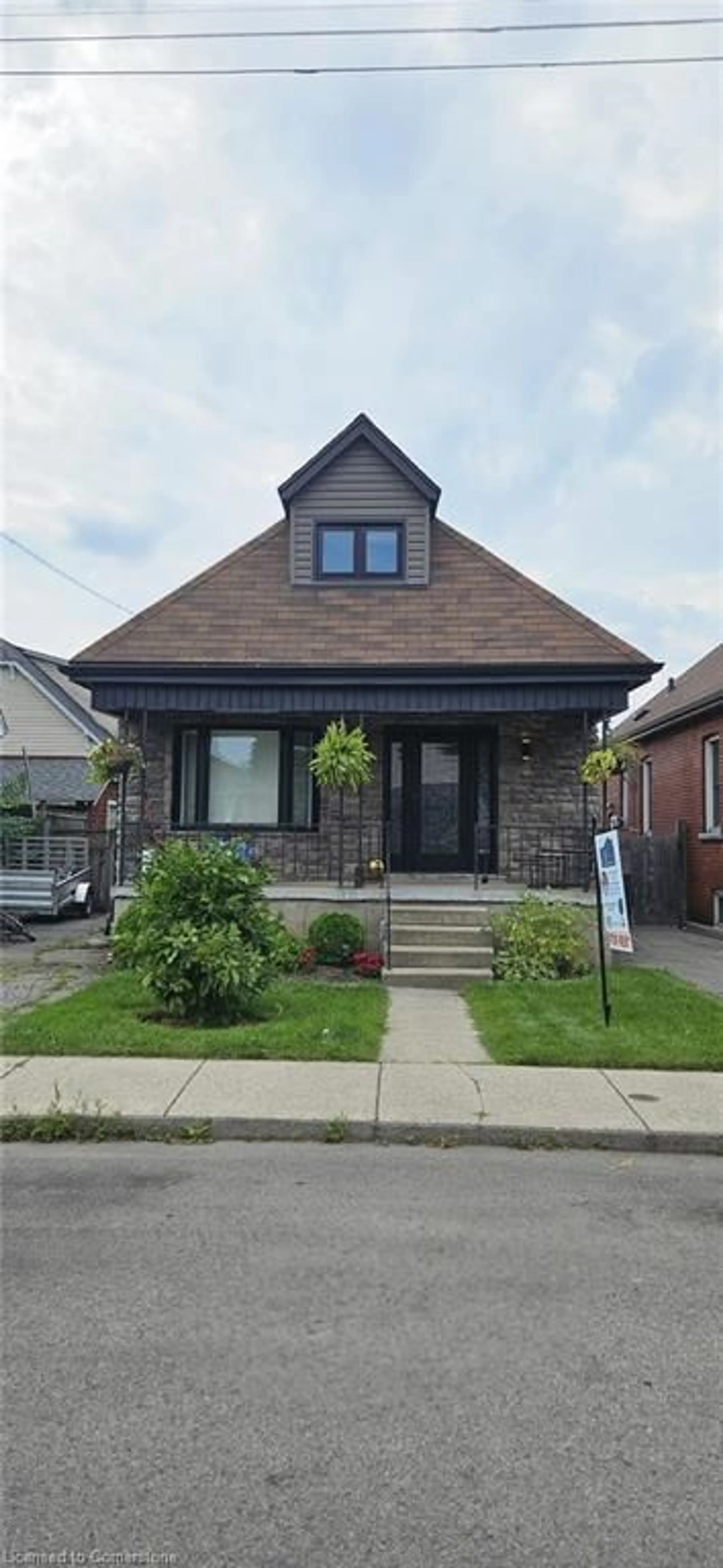 Home with brick exterior material, street for 65 Tuxedo Ave, Hamilton Ontario L8H 4P6