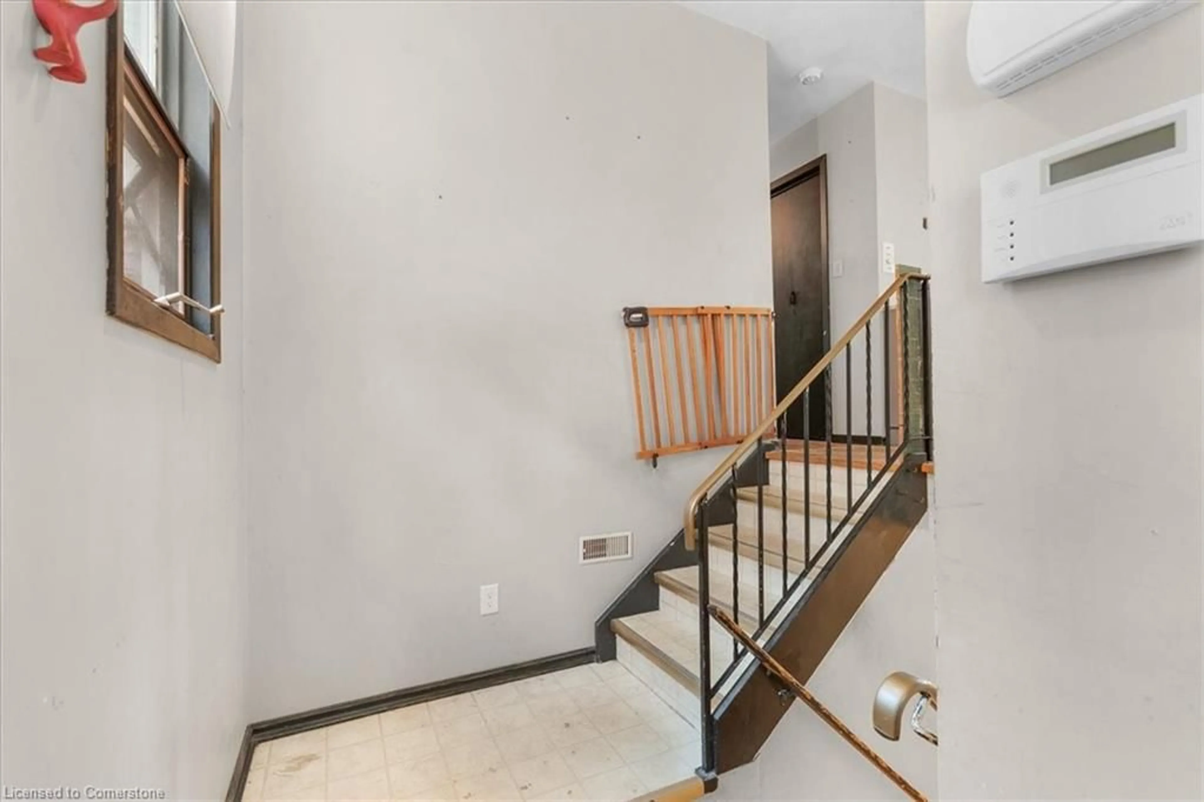 Indoor foyer for 308 Paisley Rd, Guelph Ontario N1H 2P9