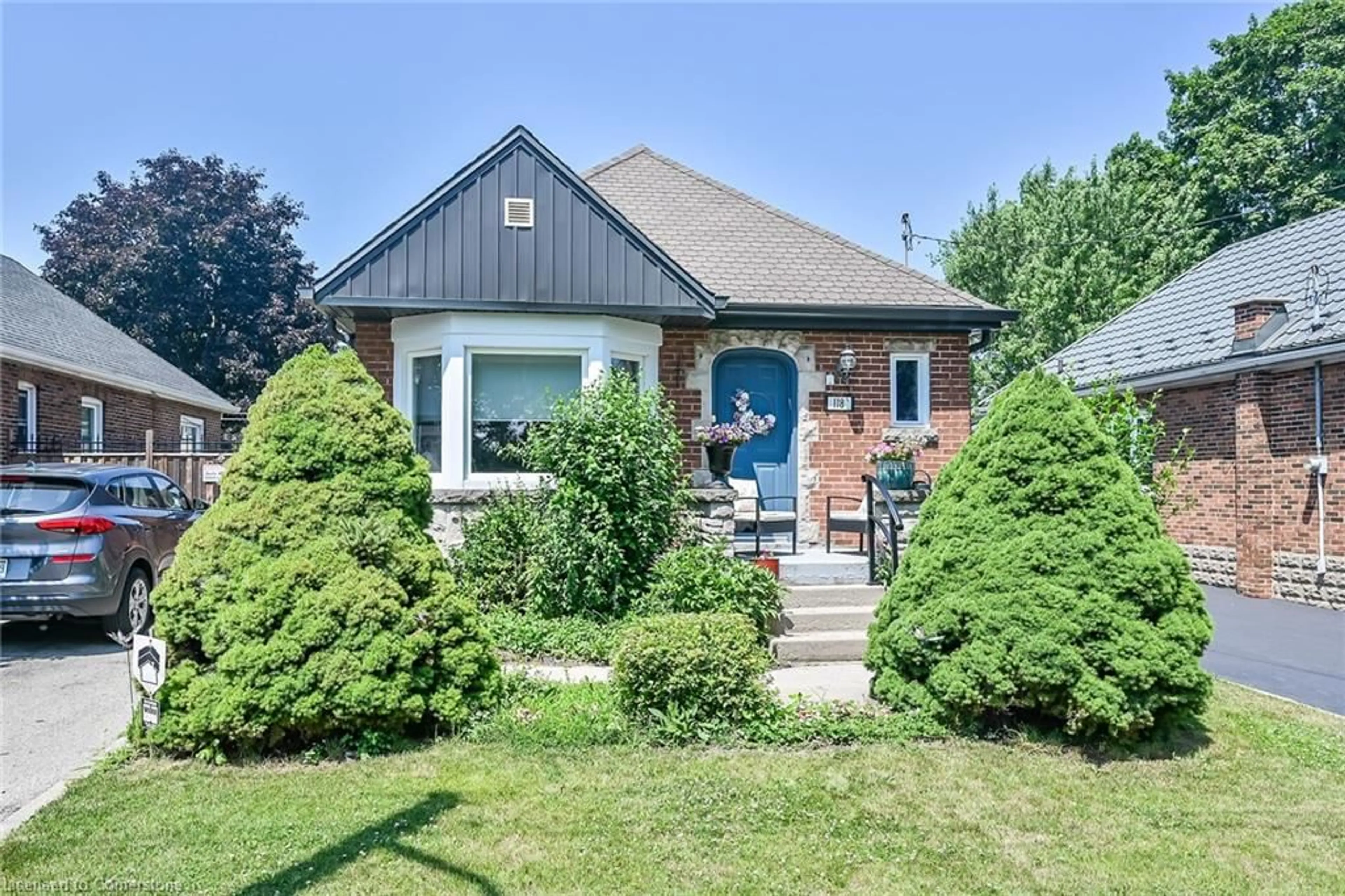 Home with brick exterior material, street for 118 East 6th St, Hamilton Ontario L9A 3C2