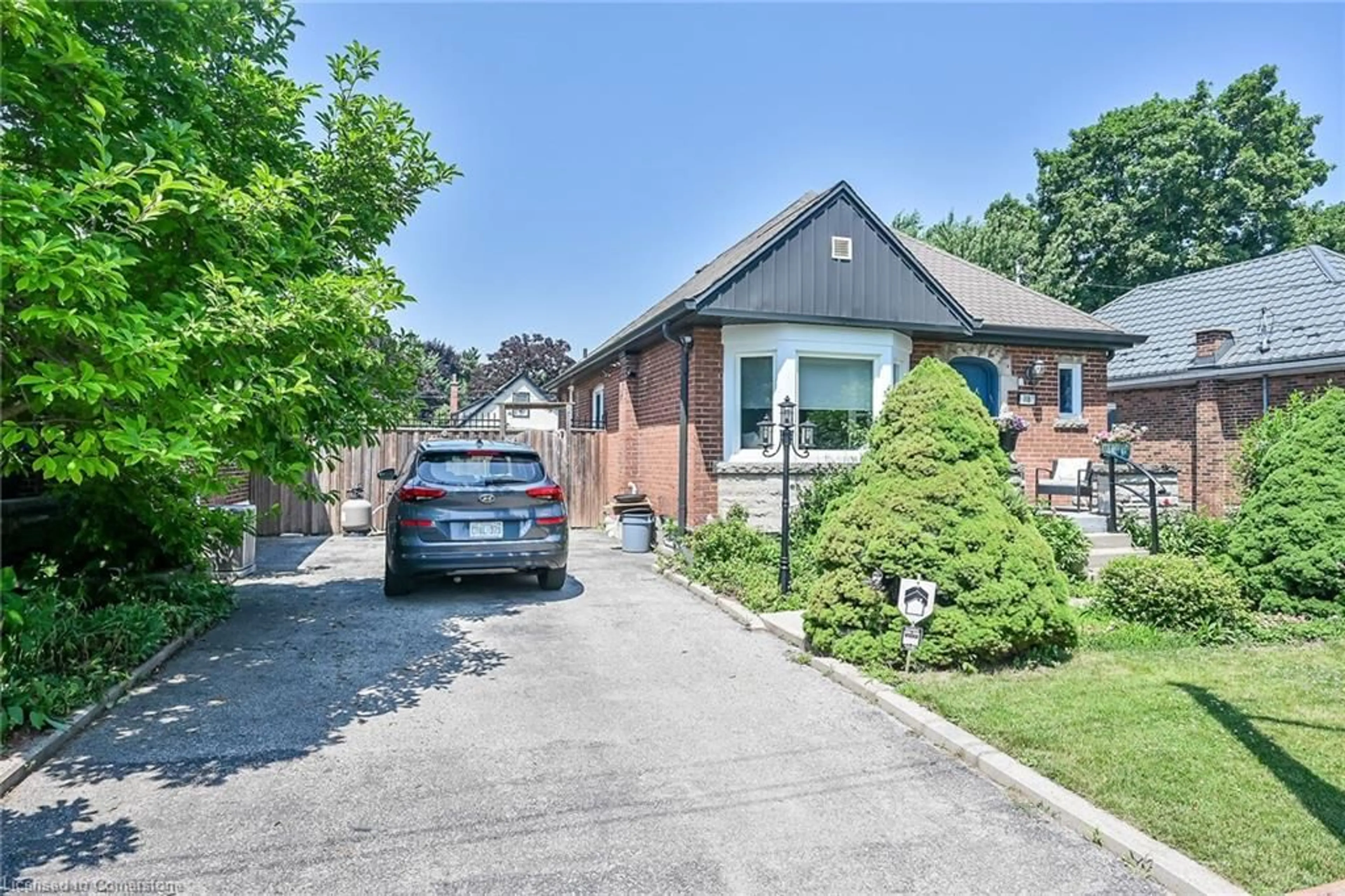 Home with brick exterior material, street for 118 East 6th St, Hamilton Ontario L9A 3C2