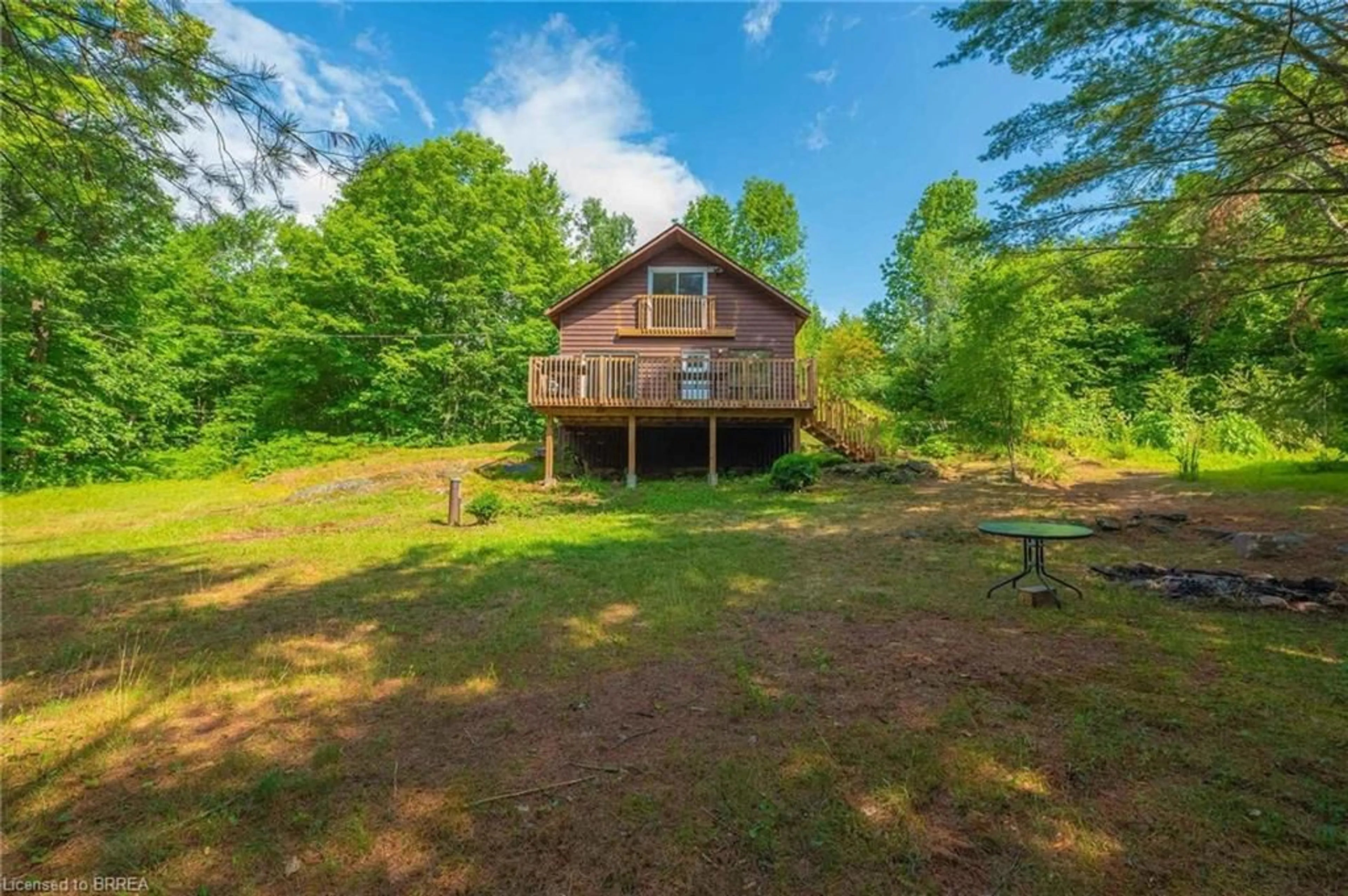 A pic from outside/outdoor area/front of a property/back of a property/a pic from drone, water/lake/river/ocean view for 1044 English Cir, Gooderham Ontario K0M 1R0