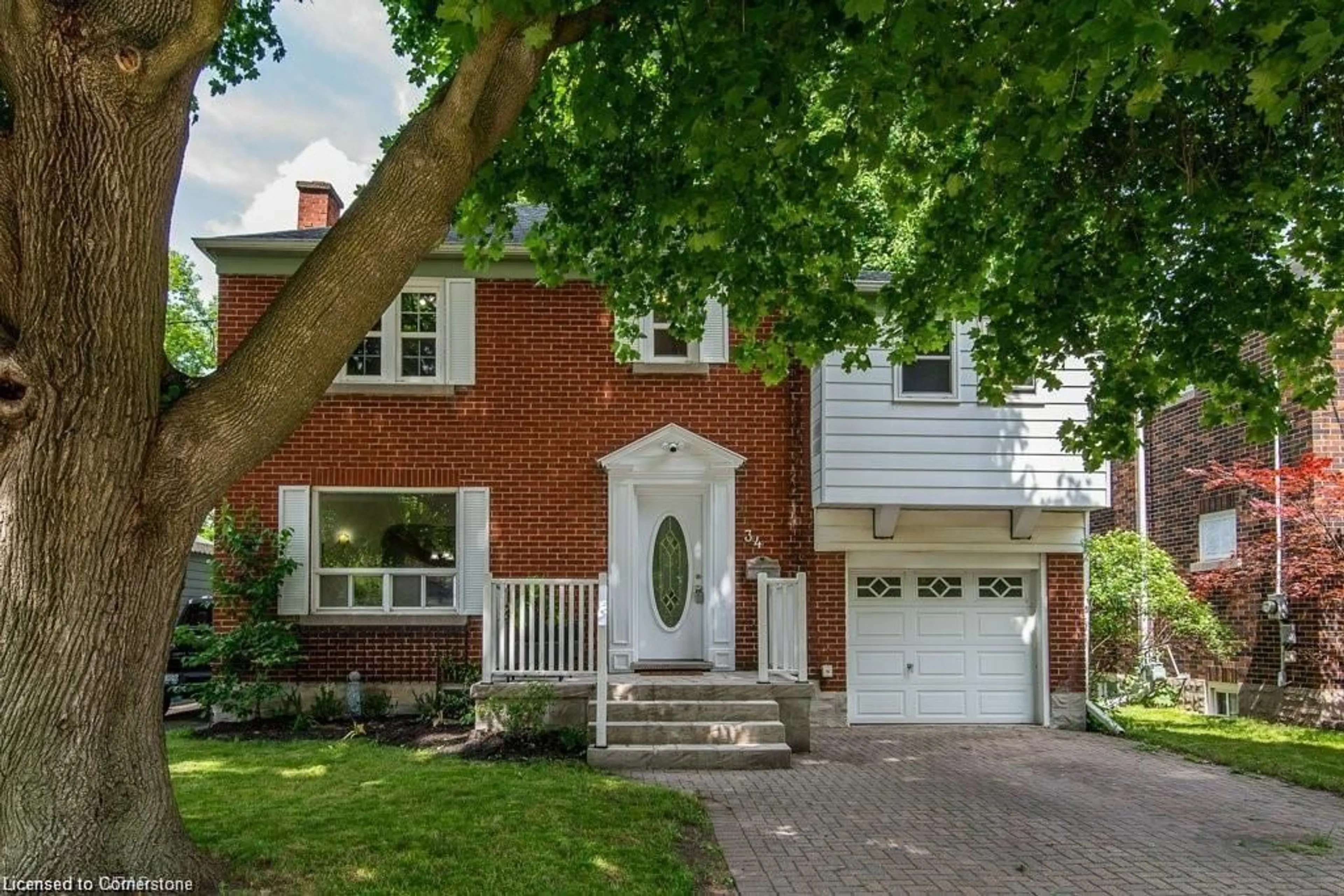 Home with brick exterior material, street for 34 Moore Ave, Waterloo Ontario N2J 3E5