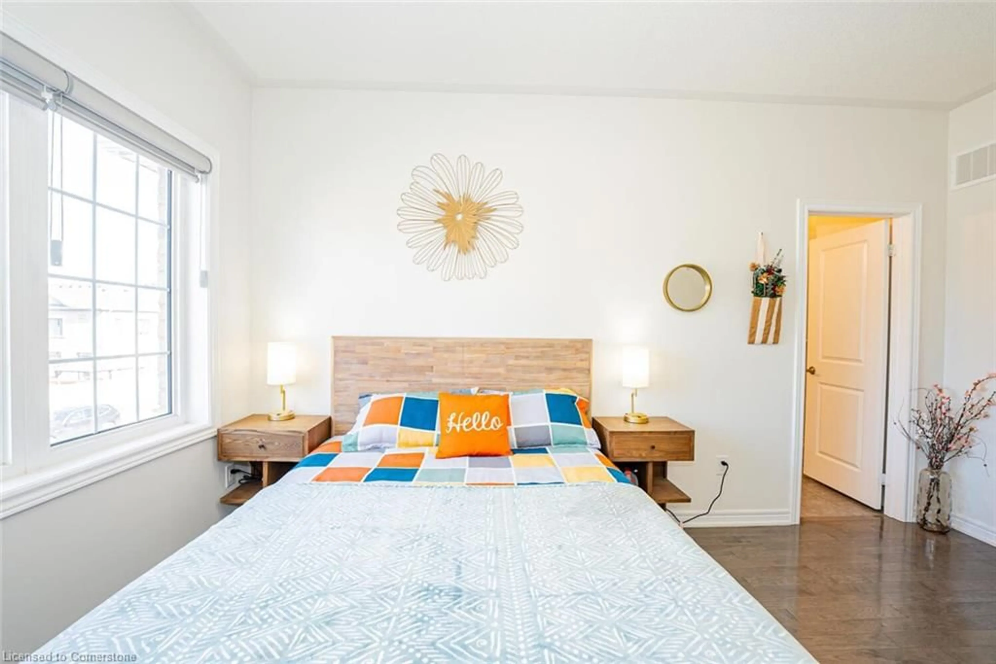 Bedroom with bed, wood/laminate floor for 22 Fruitvale Cir, Brampton Ontario L7A 5B9