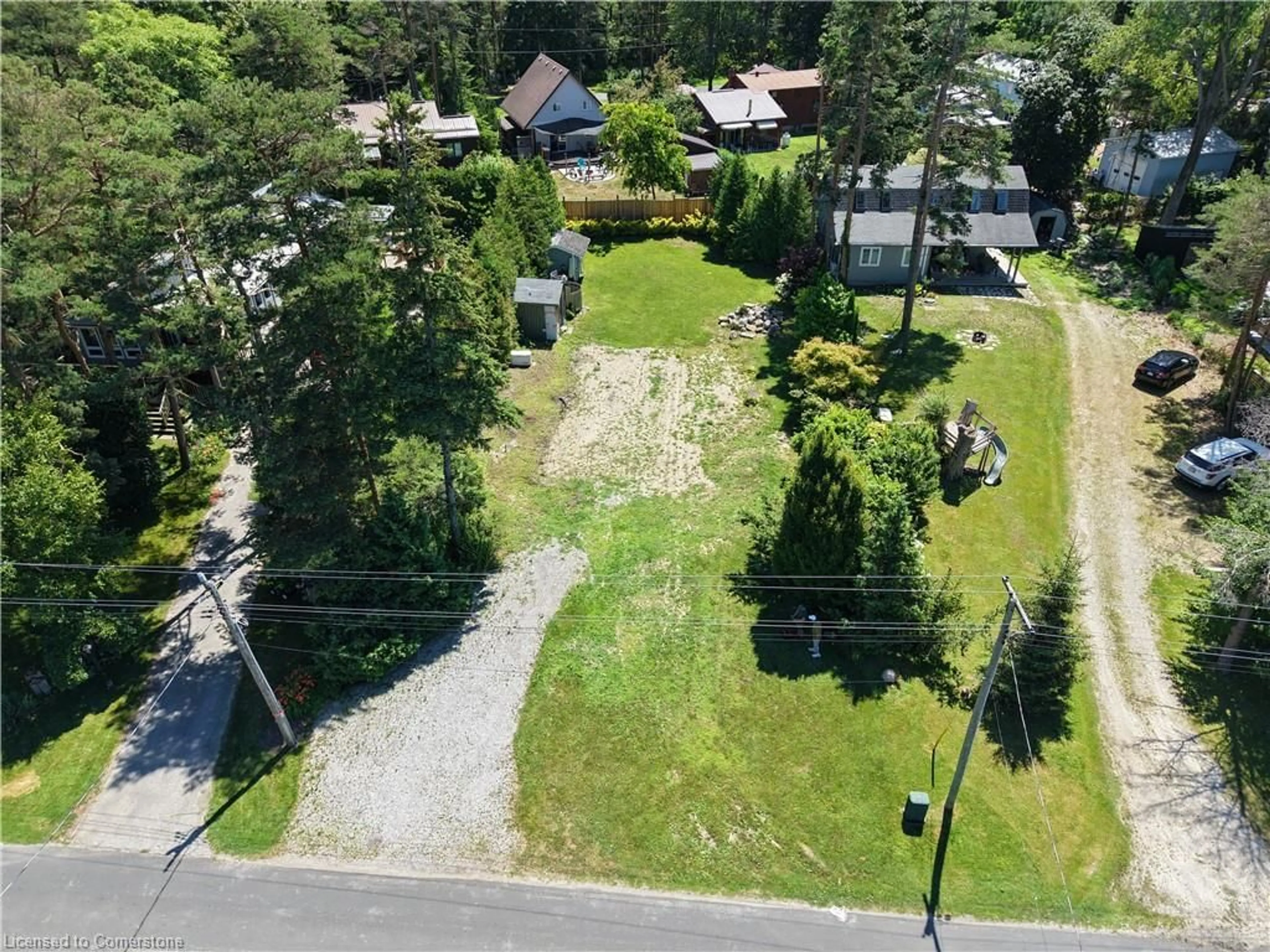 A pic from outside/outdoor area/front of a property/back of a property/a pic from drone, street for 7 Old Cut Blvd Blvd, Long Point Ontario N0E 1G0
