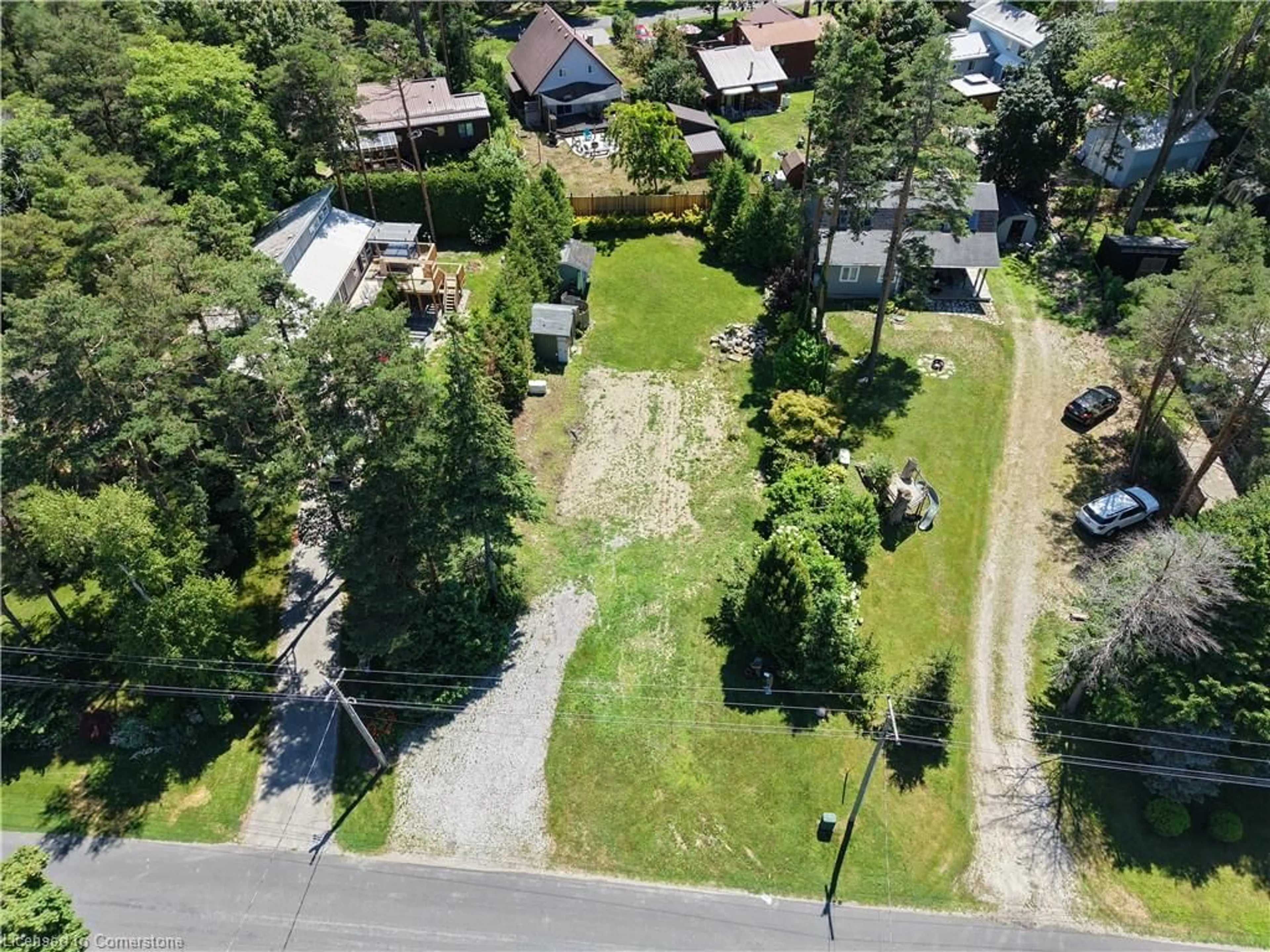 A pic from outside/outdoor area/front of a property/back of a property/a pic from drone, street for 7 Old Cut Blvd Blvd, Long Point Ontario N0E 1G0