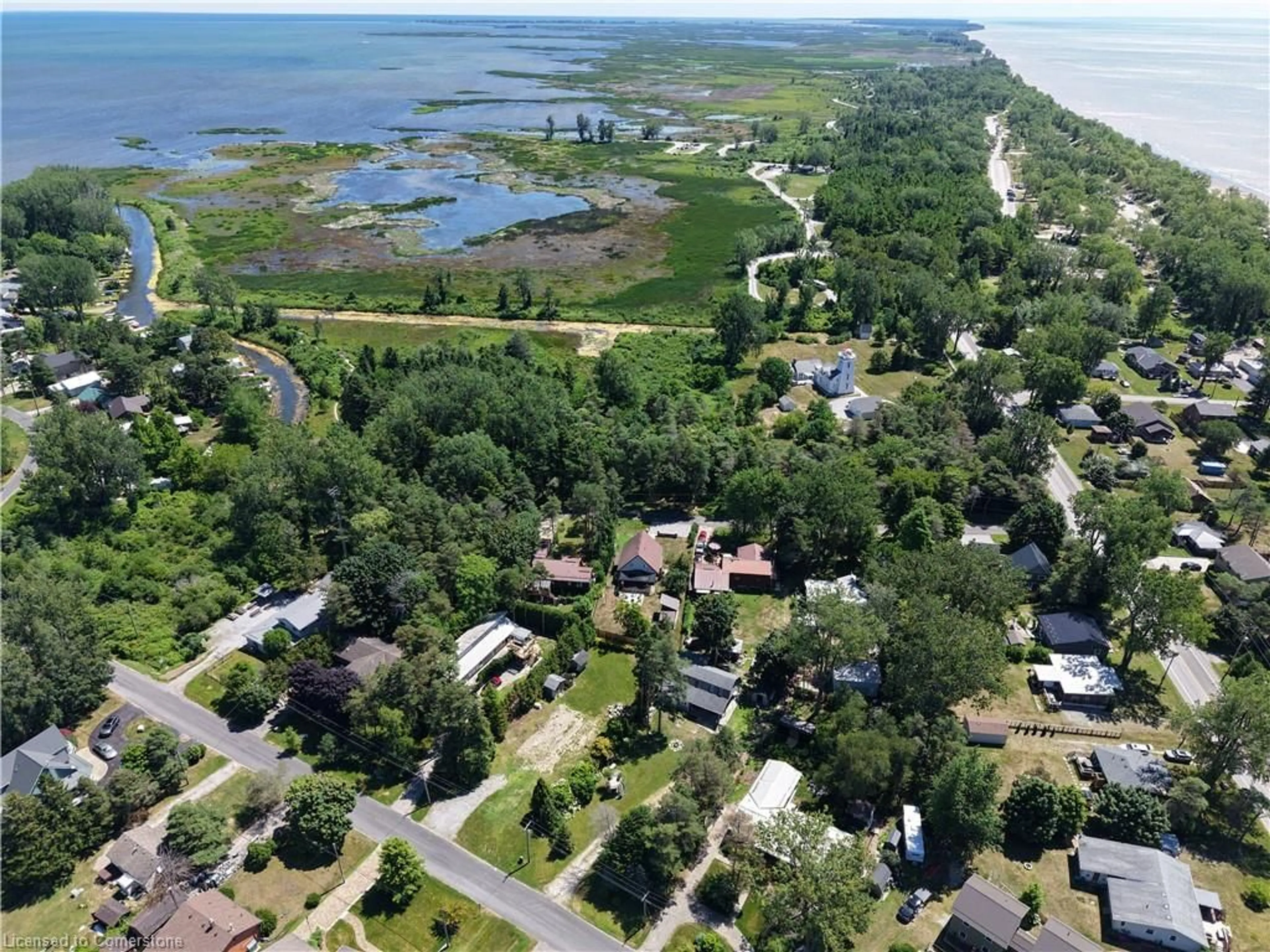 A pic from outside/outdoor area/front of a property/back of a property/a pic from drone, water/lake/river/ocean view for 7 Old Cut Blvd Blvd, Long Point Ontario N0E 1G0