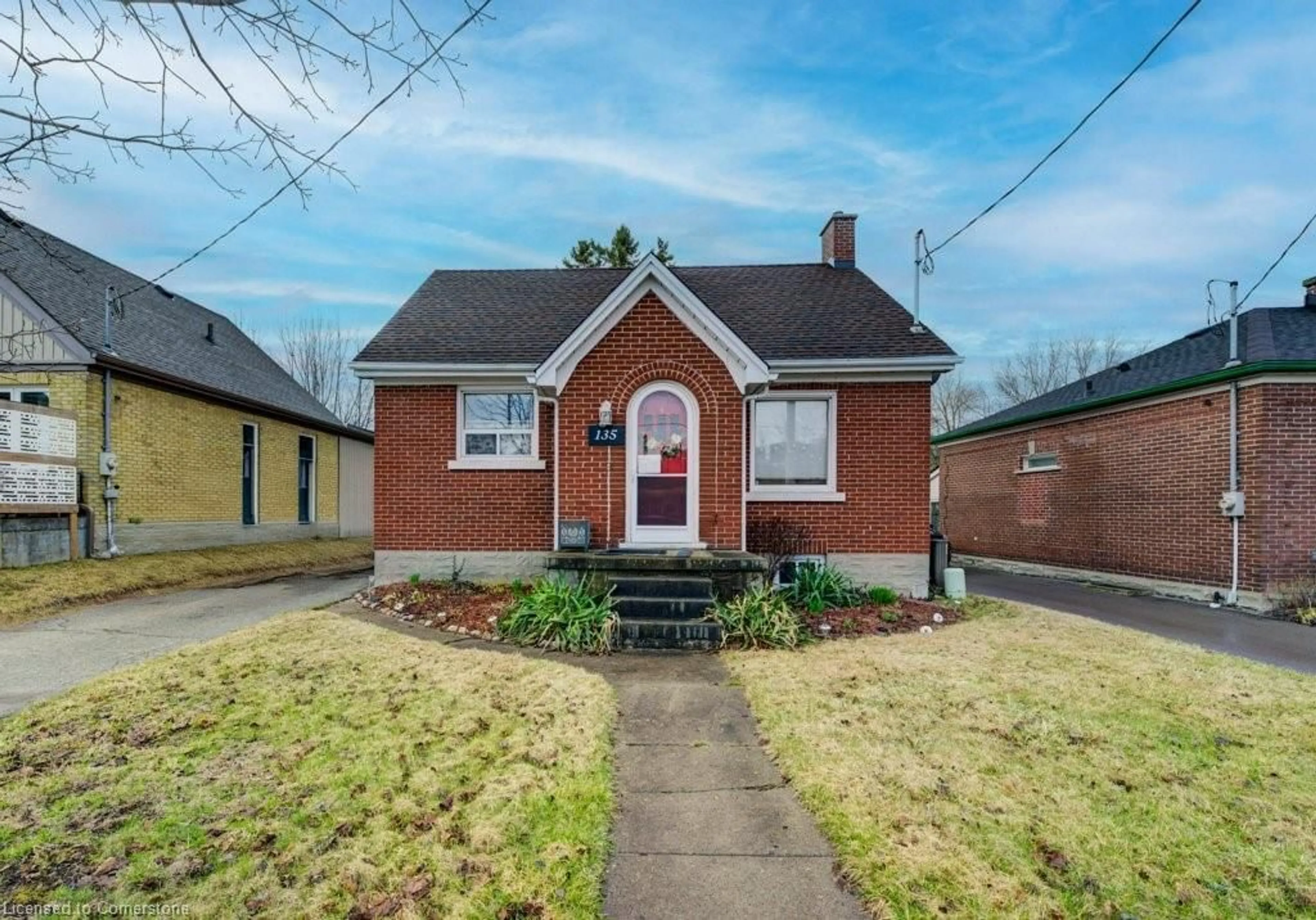 Home with brick exterior material, street for 135 Stirling Ave, Kitchener Ontario N2G 3N8