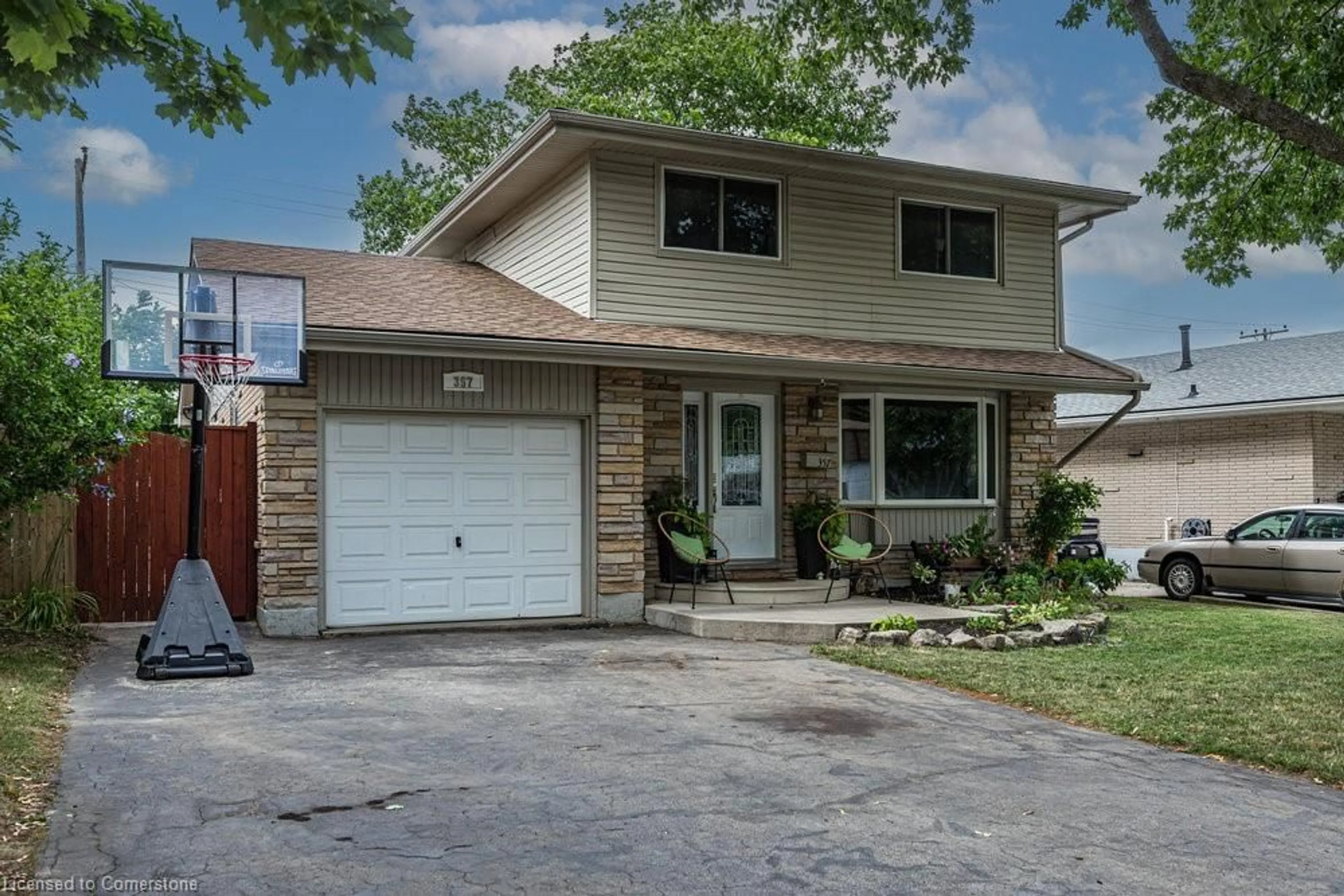 Home with vinyl exterior material, street for 357 Saint Andrews Dr, Hamilton Ontario L8K 5K6