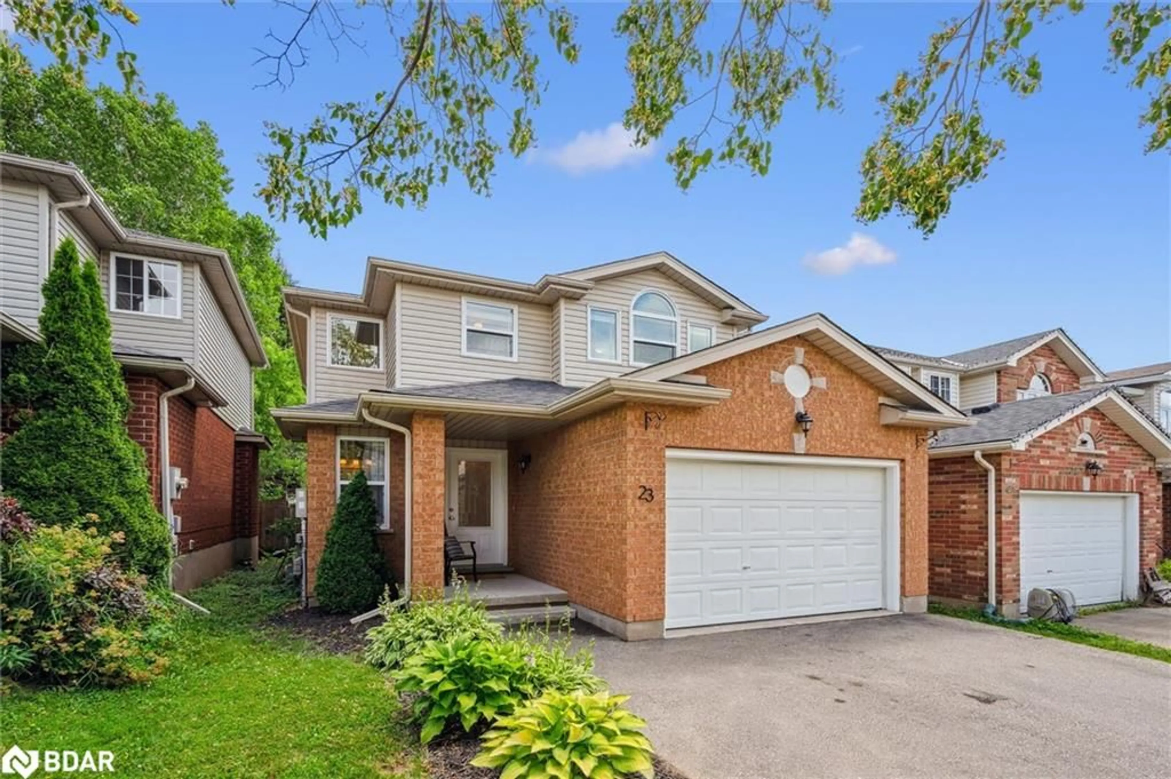 Home with brick exterior material, street for 23 Fuller Dr, Guelph Ontario N1E 7J4