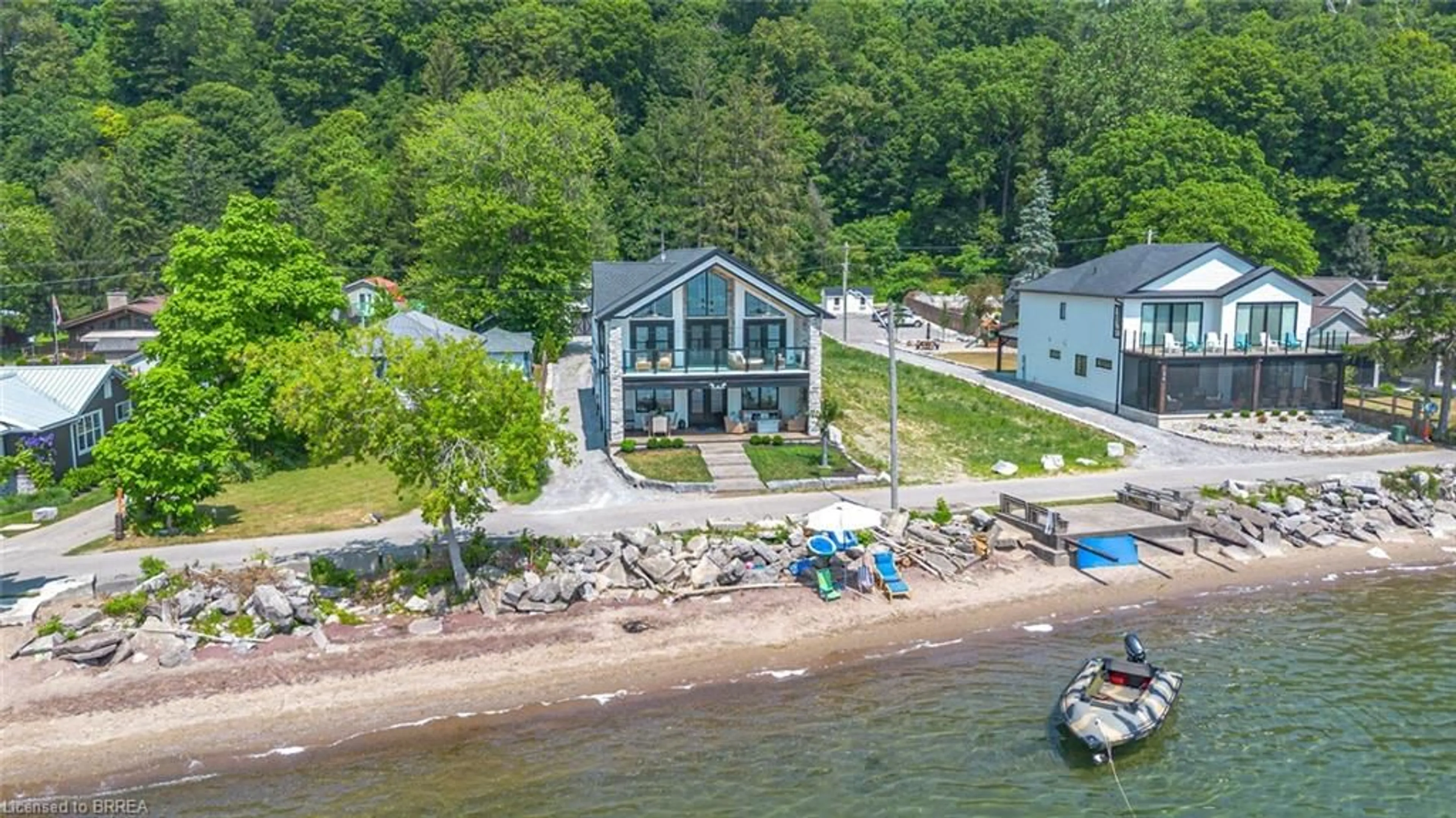 A pic from outside/outdoor area/front of a property/back of a property/a pic from drone, water/lake/river/ocean view for 33 Cedar Dr, Turkey Point Ontario N0E 1T0