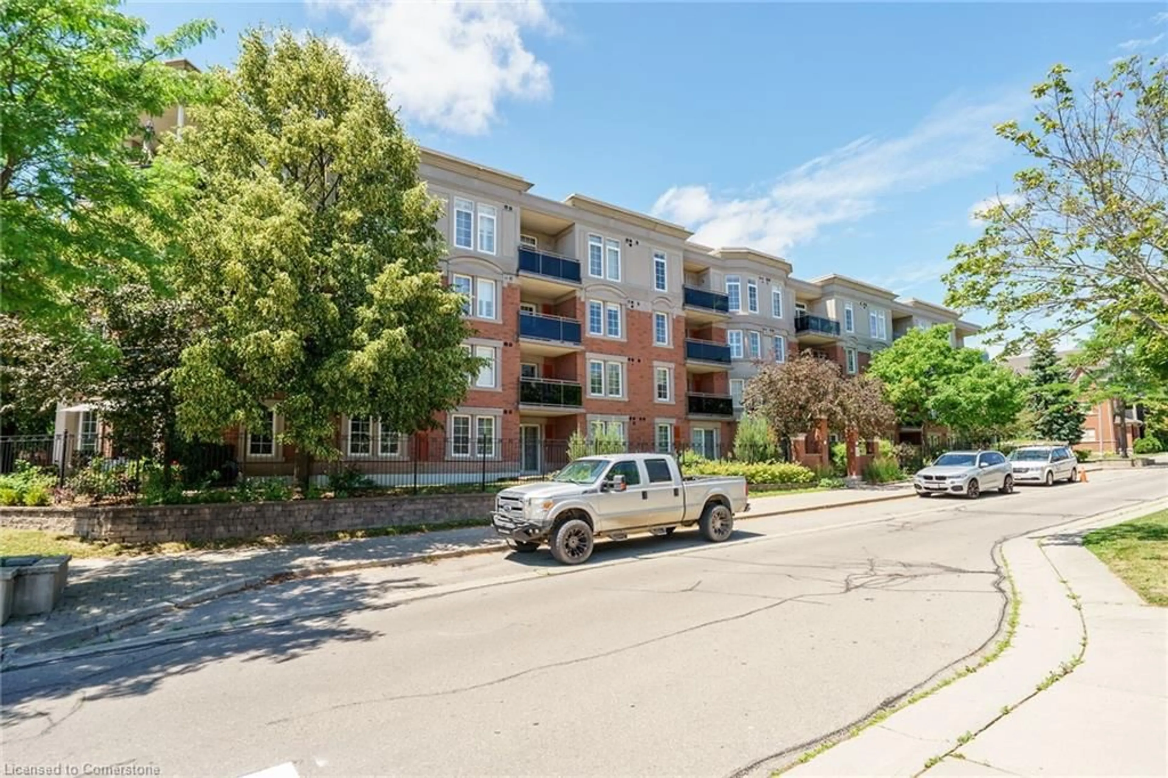A pic from outside/outdoor area/front of a property/back of a property/a pic from drone, street for 2300 Parkhaven Blvd #407, Oakville Ontario L6H 6V9