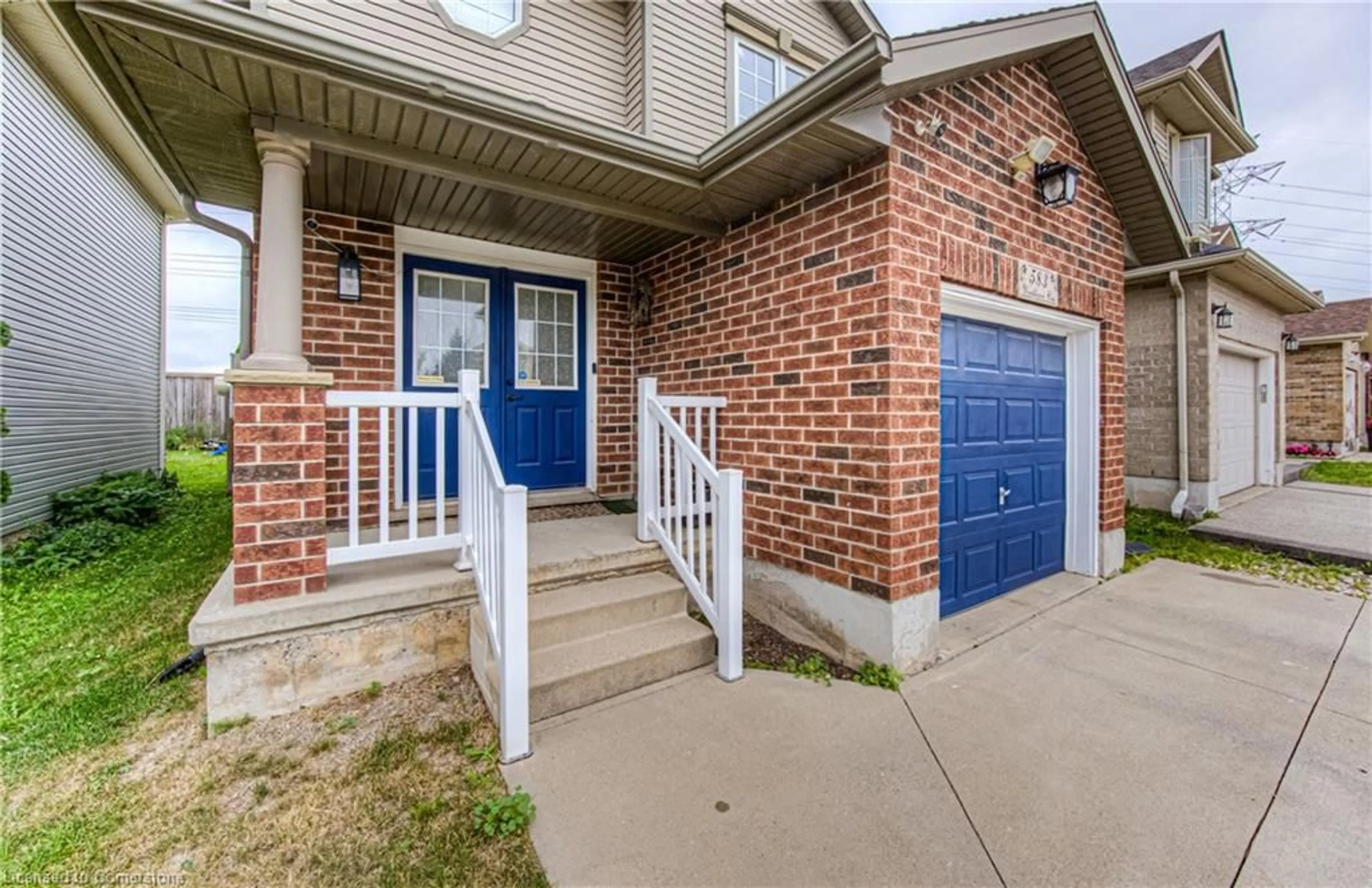 Home with brick exterior material, street for 583 Windflower Cres, Kitchener Ontario N2E 4E3