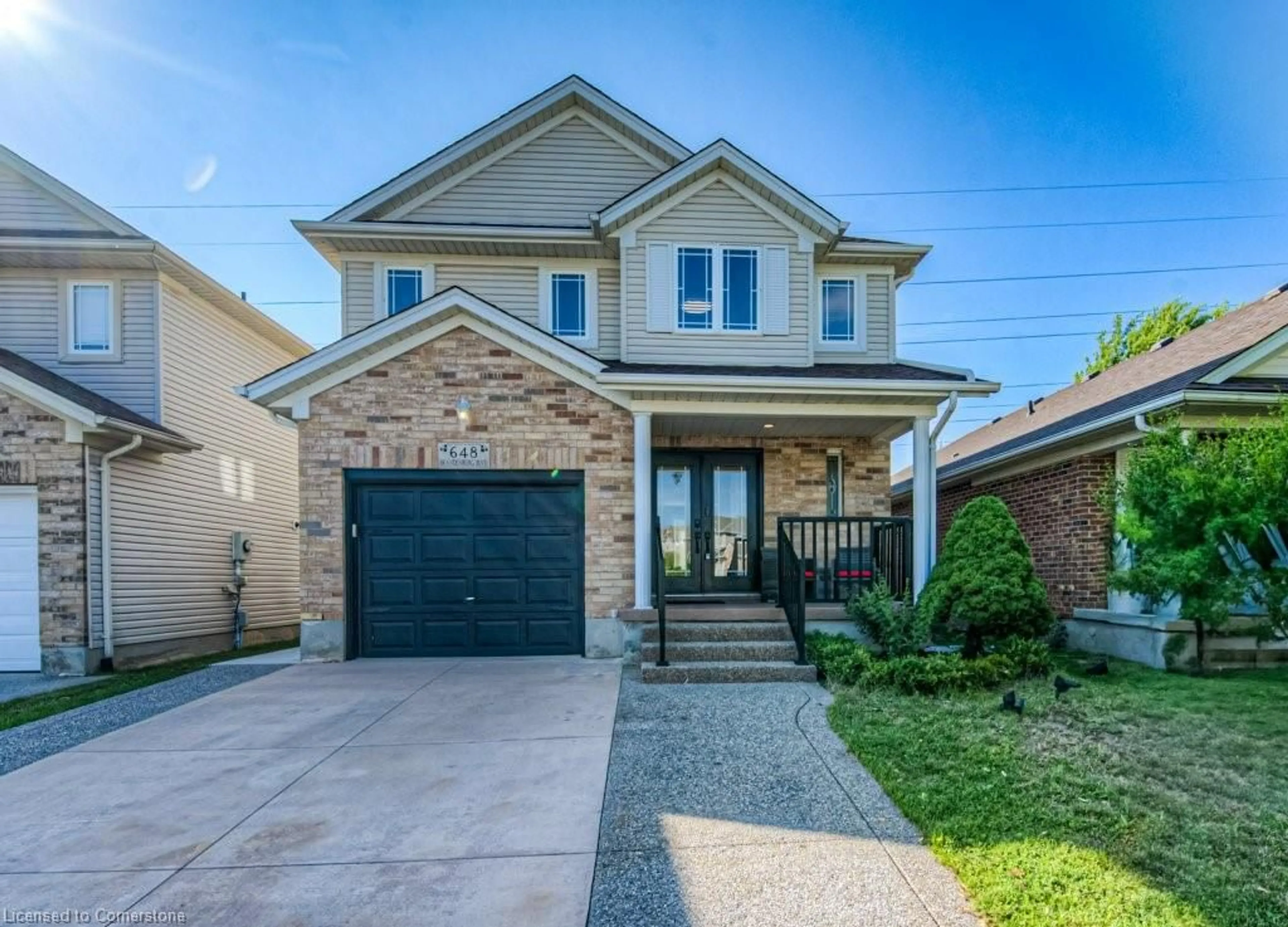 Home with brick exterior material, street for 648 Brandenburg Blvd, Waterloo Ontario N2T 2V3