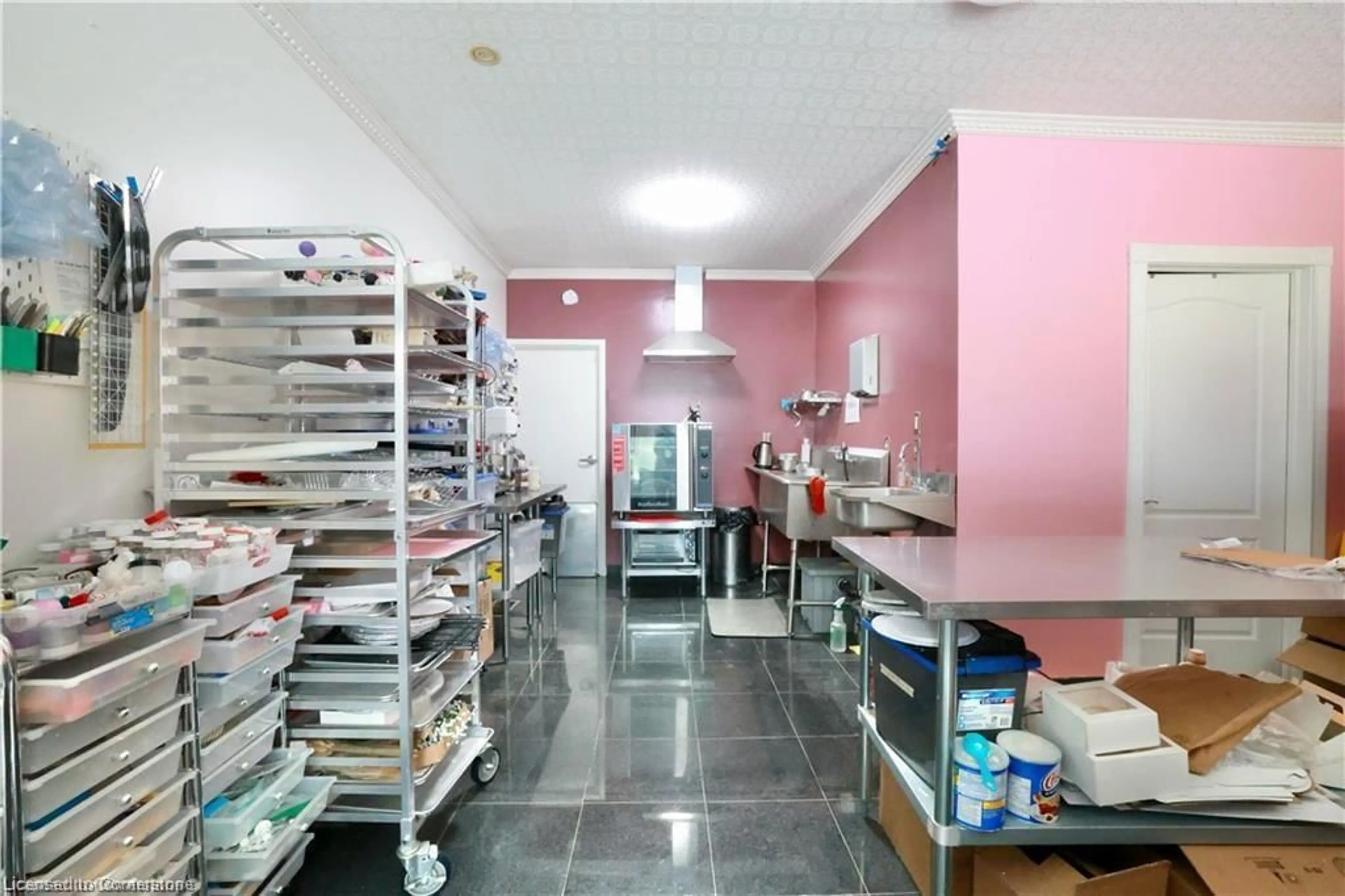 Kitchen with laundary machines, unknown for 619 Wild Ginger Ave #B11, Waterloo Ontario N2V 2X1