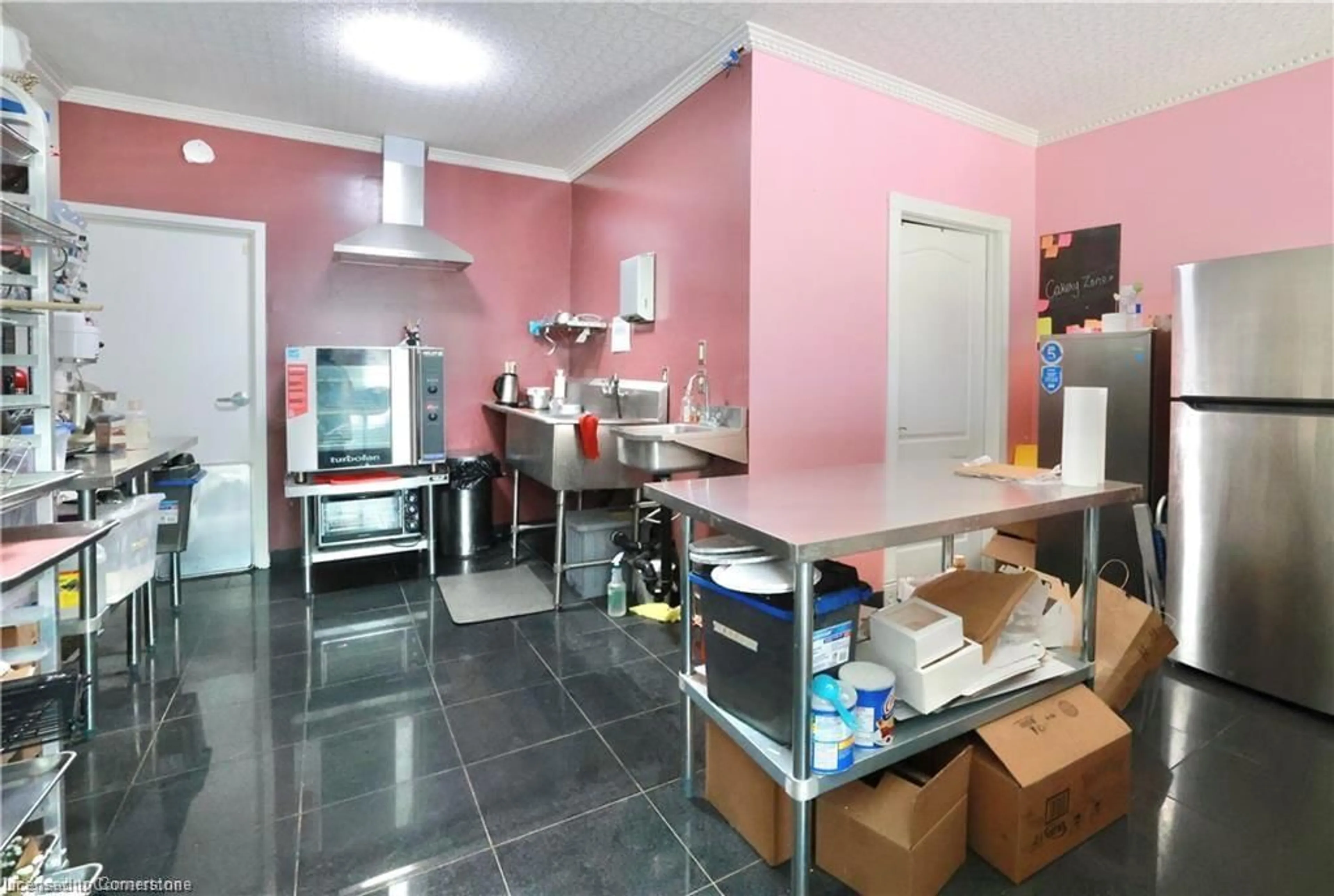 Kitchen with laundary machines, unknown for 619 Wild Ginger Ave #B11, Waterloo Ontario N2V 2X1
