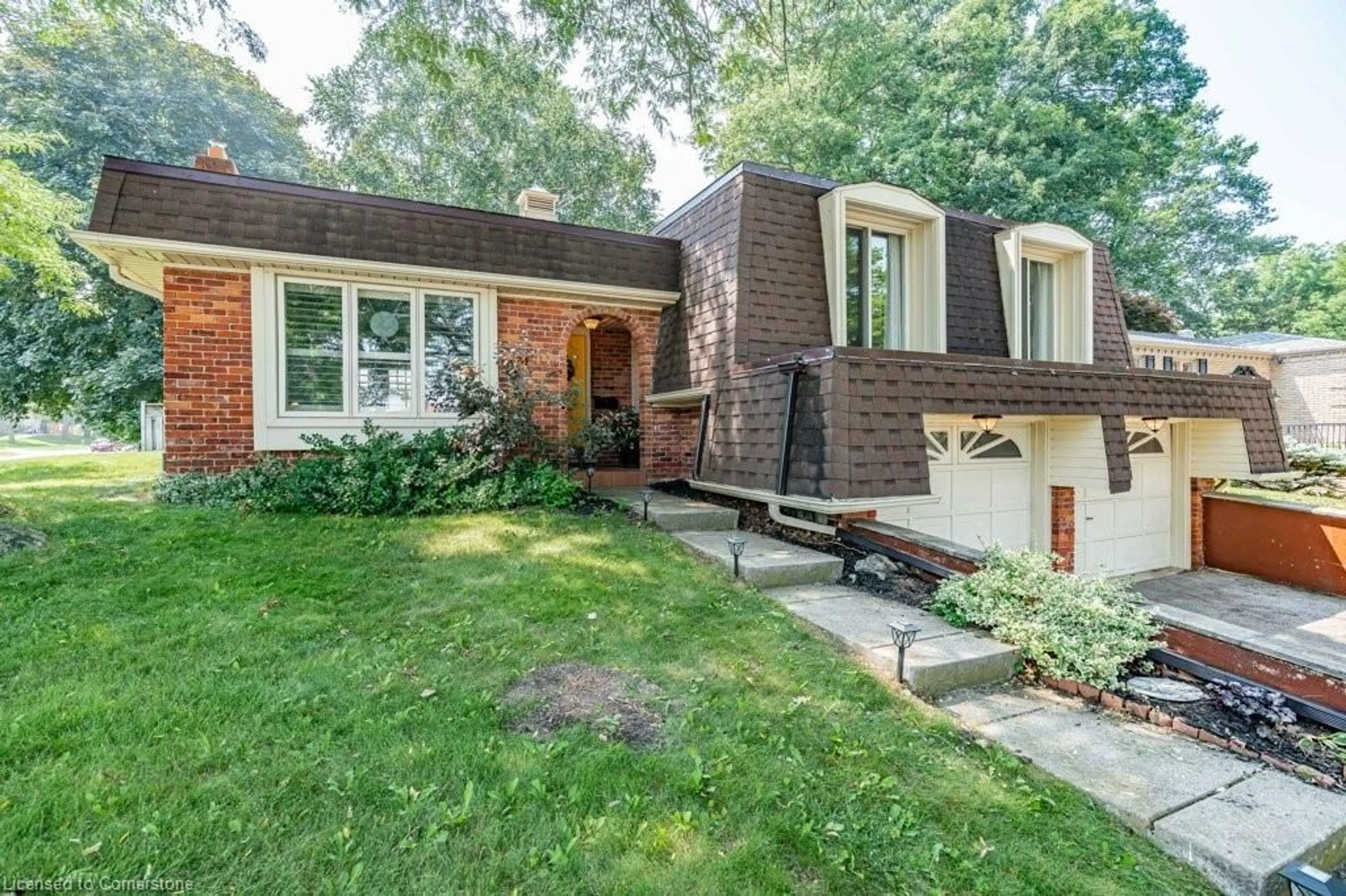 Home with brick exterior material, street for 44 Cedarland Dr, Brantford Ontario N3R 6N7