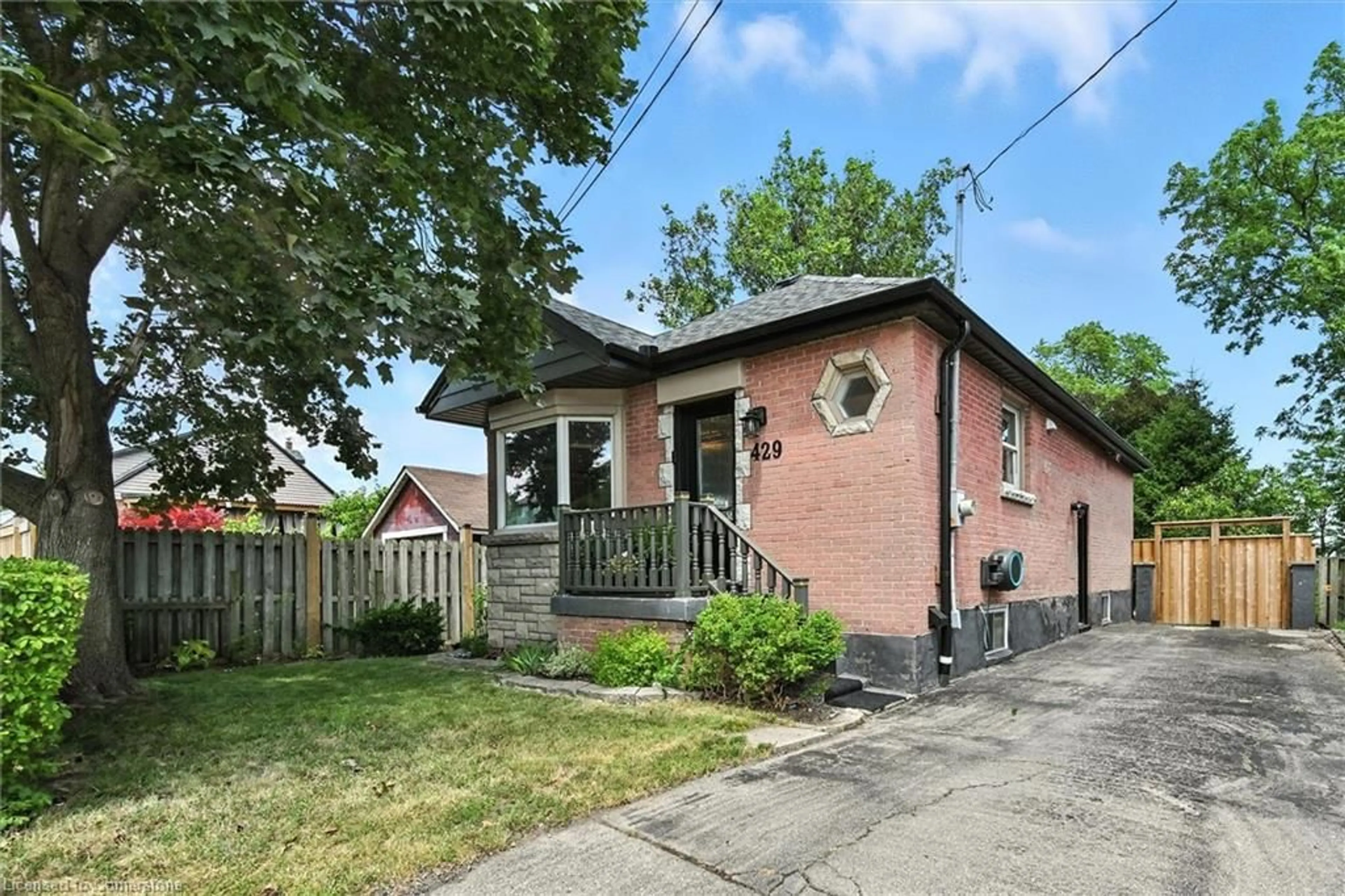 Home with brick exterior material, street for 429 Fennell Ave, Hamilton Ontario L9A 1V1