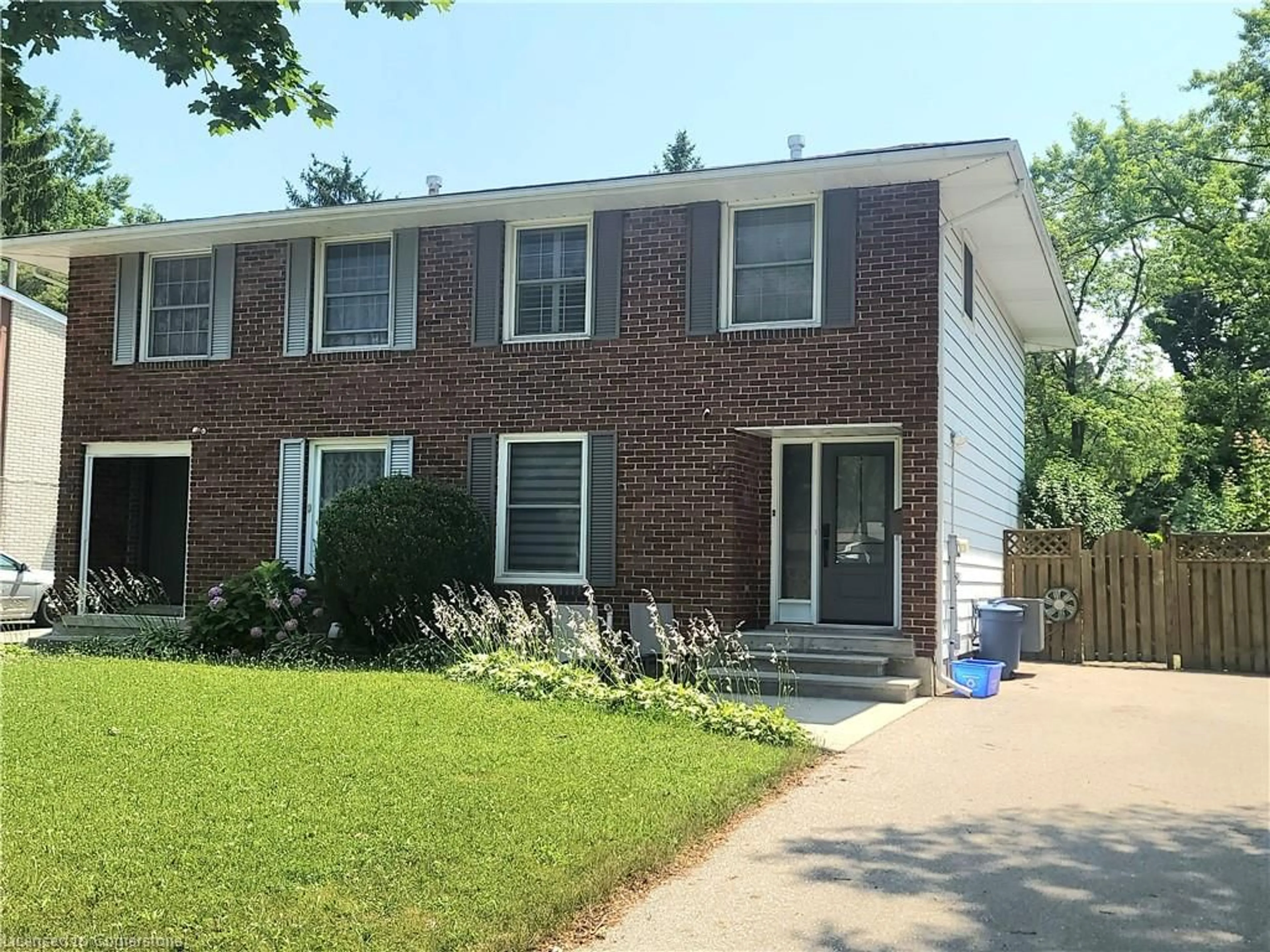 Home with brick exterior material, street for 65 Selkirk Dr, Kitchener Ontario N2E 1M5