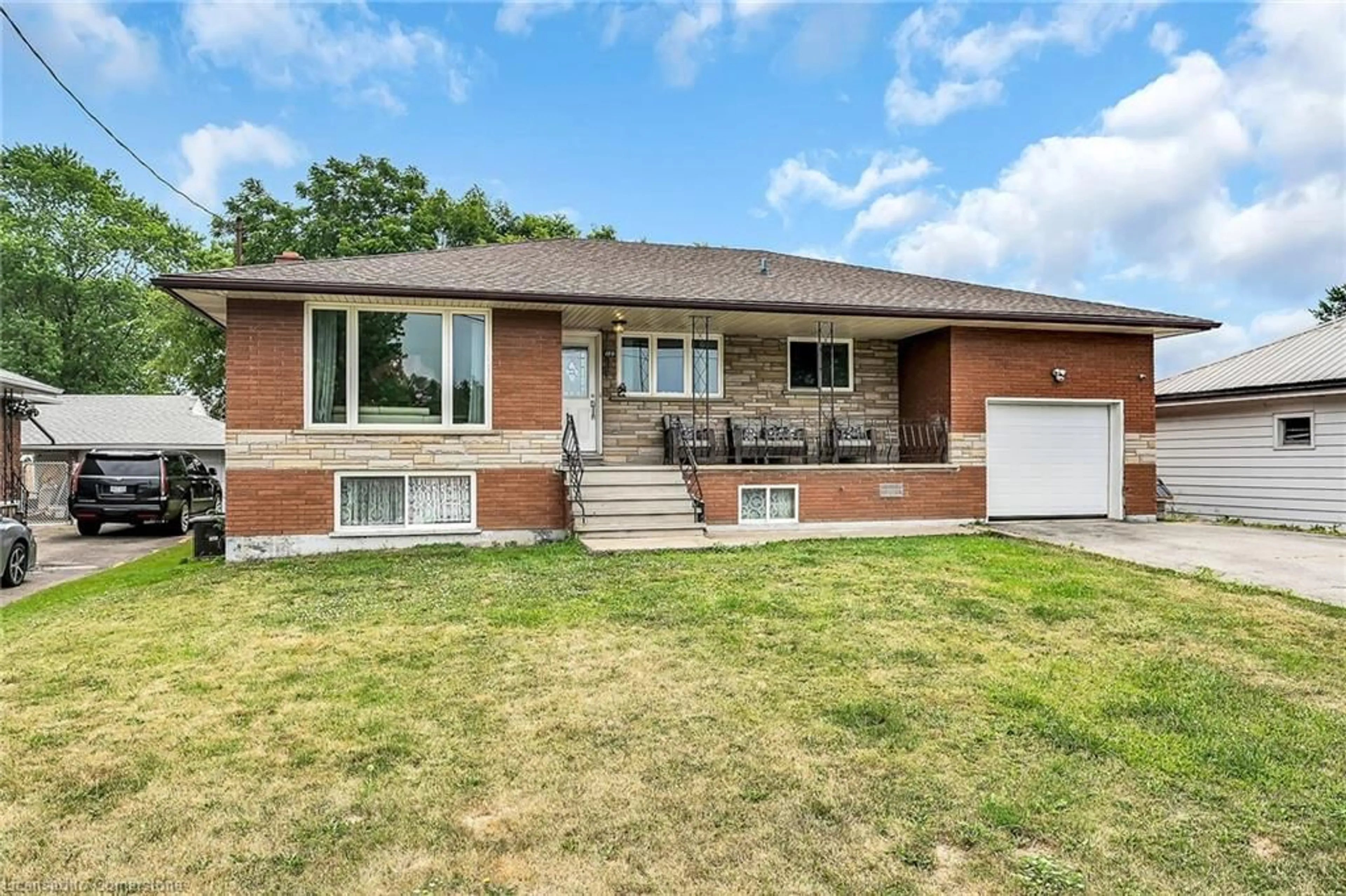 Home with brick exterior material, street for 180 West Side Rd, Port Colborne Ontario L3K 5K7