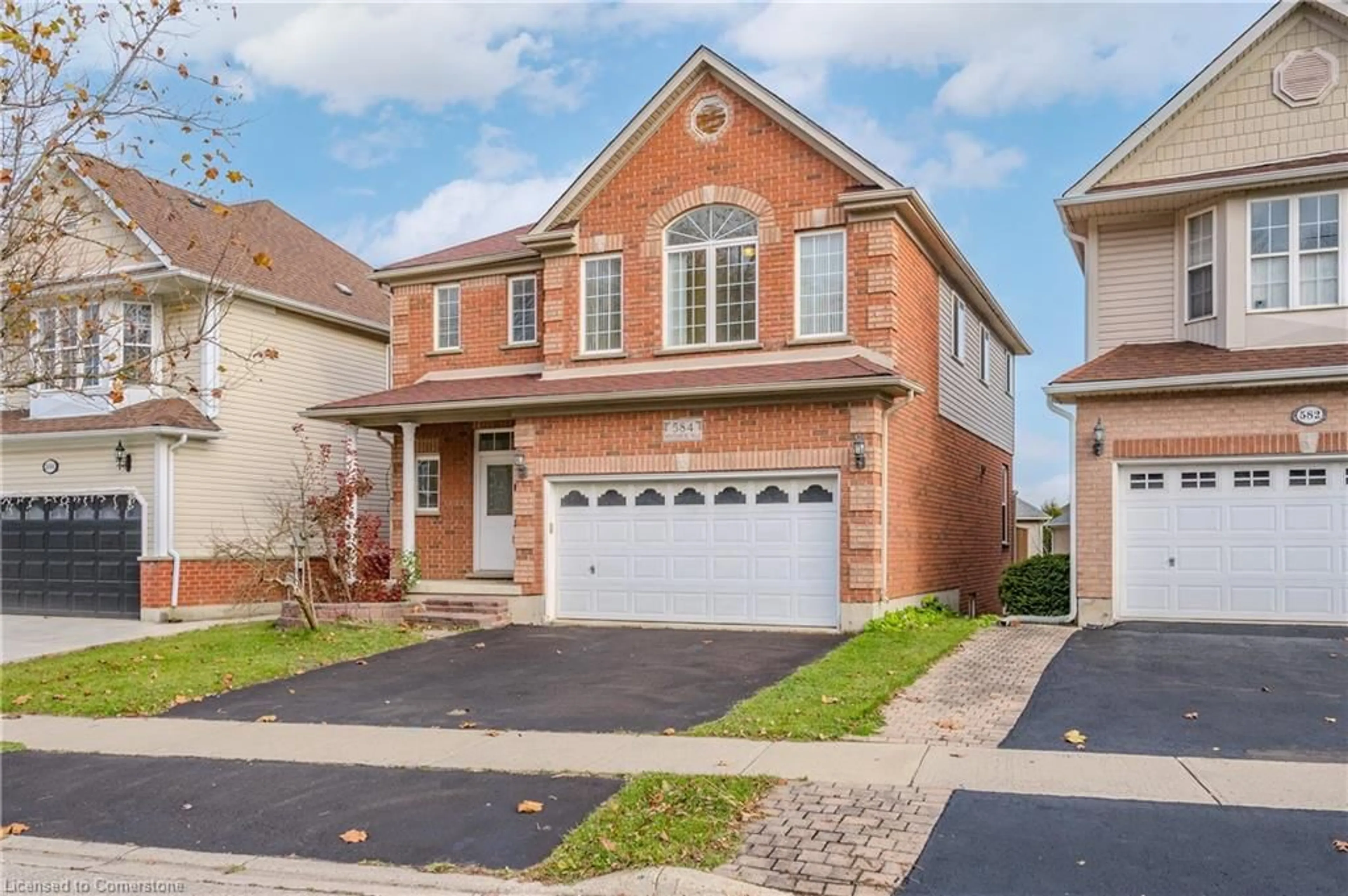 Home with brick exterior material, street for 584 Winterburg Walk, Waterloo Ontario N2V 2M8
