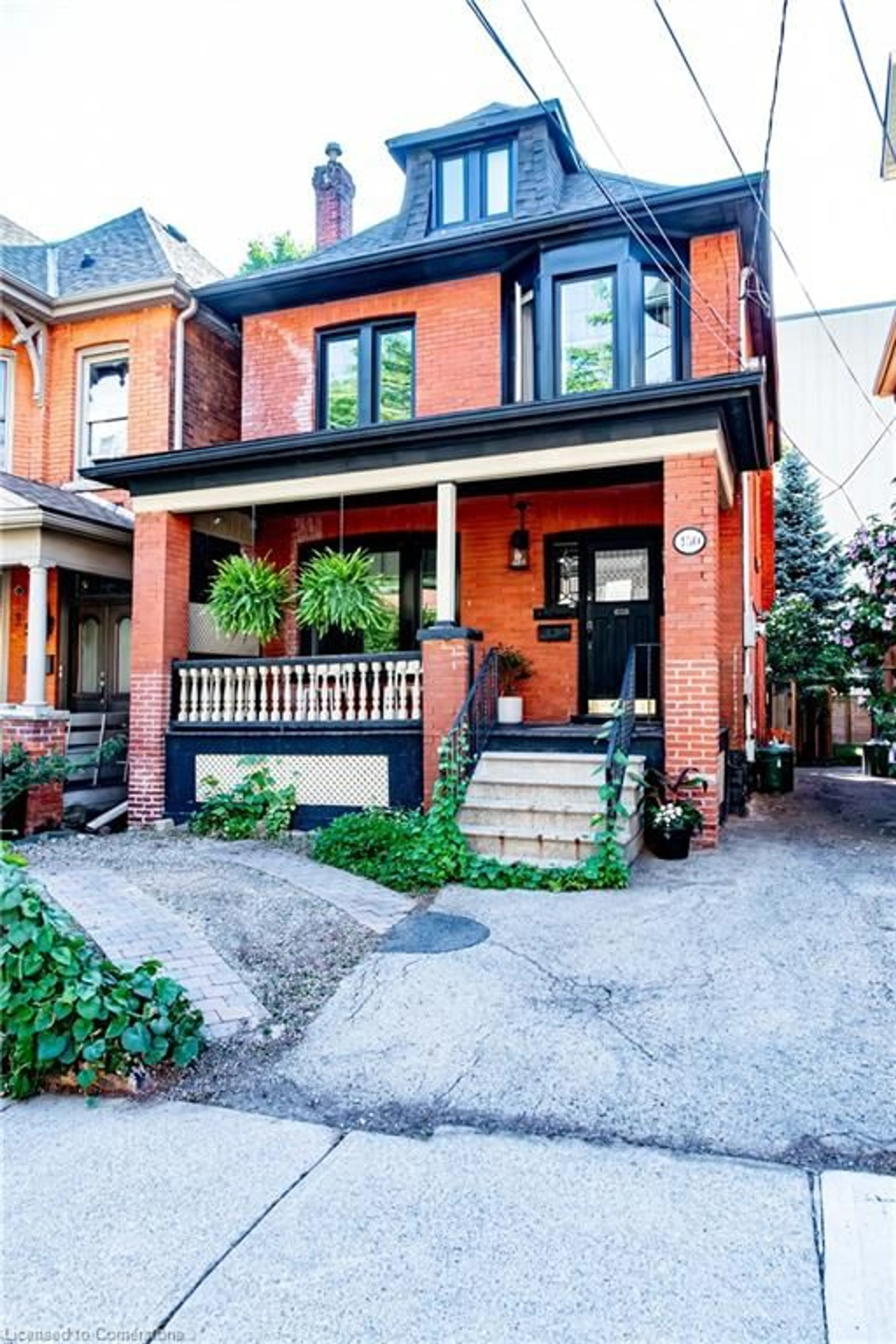 Home with brick exterior material, street for 150 Caroline St, Hamilton Ontario L8P 3K9