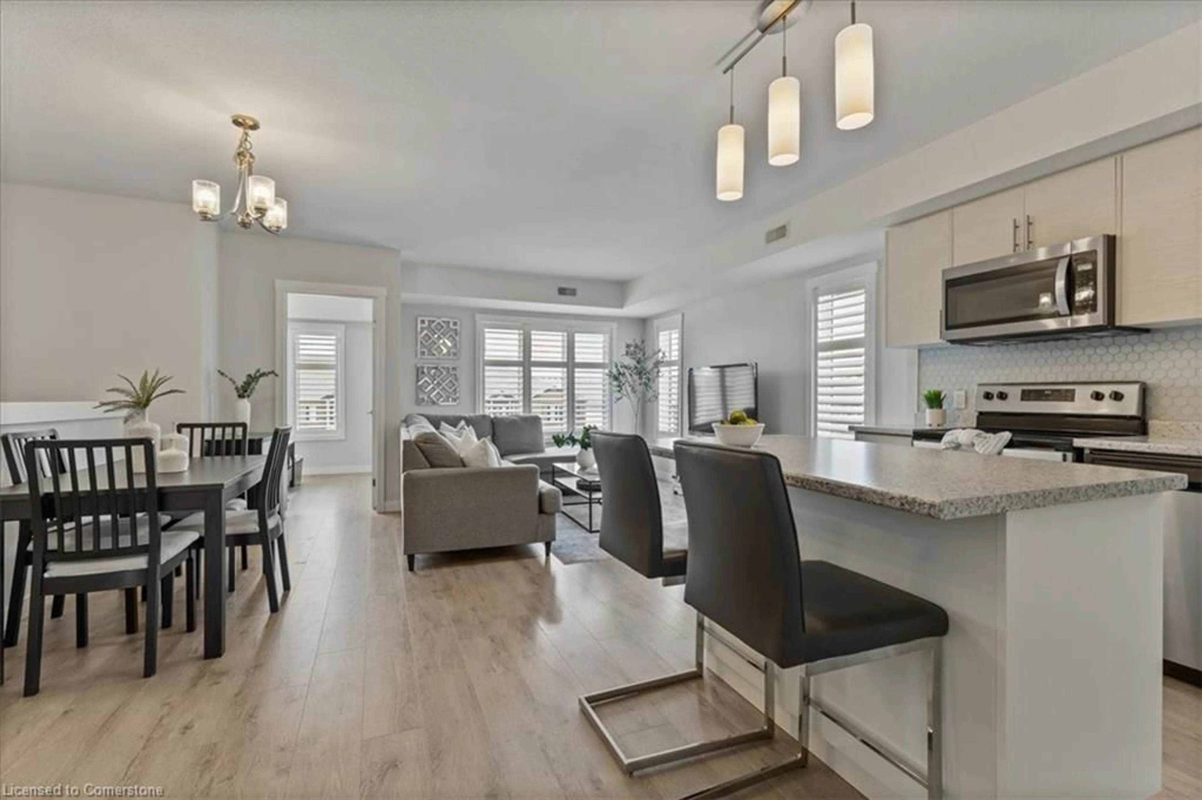 Open concept kitchen, wood/laminate floor for 166 Rochefort St #B, Kitchener Ontario N2R 0P5