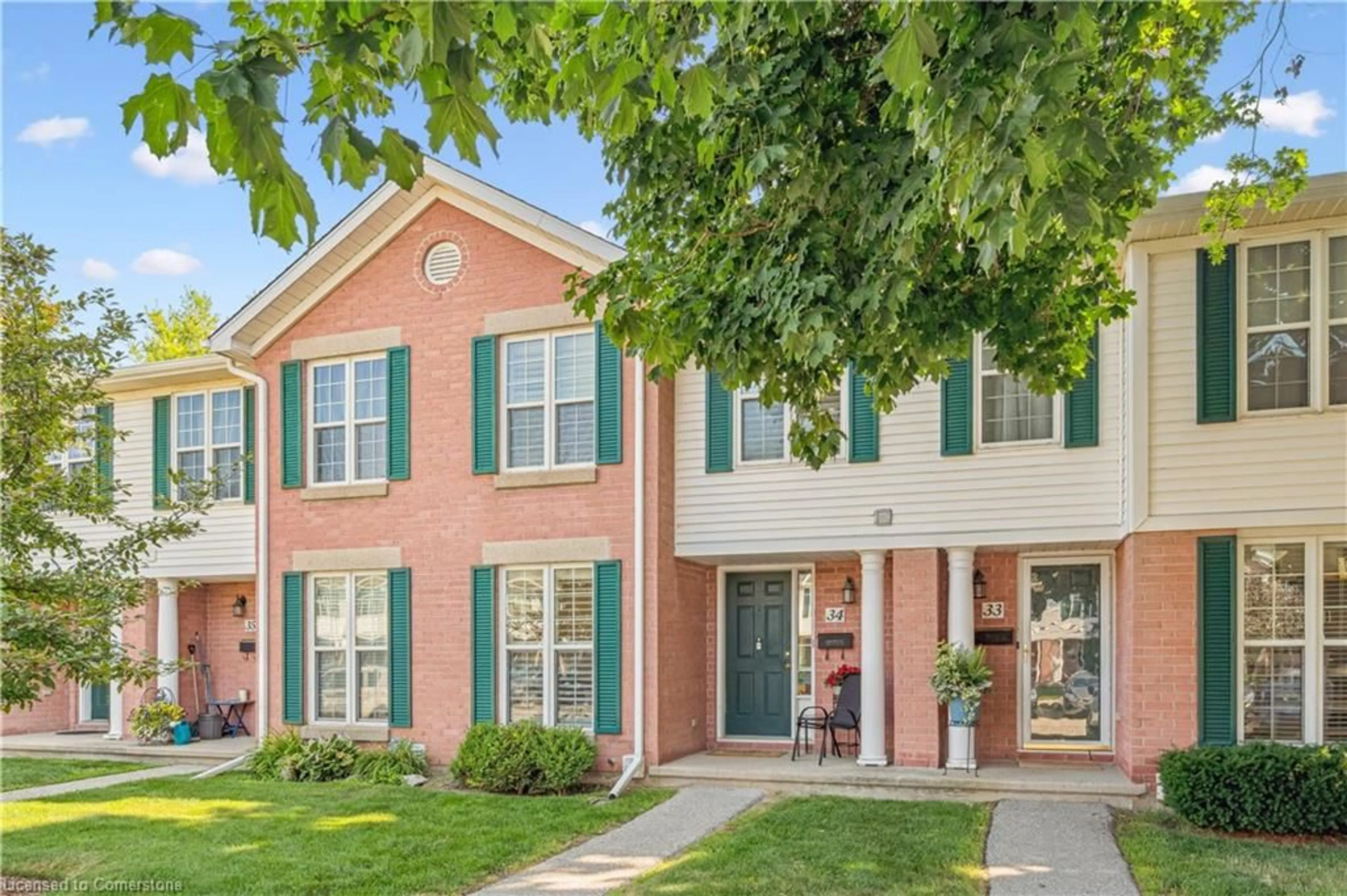 Home with brick exterior material, street for 465 Woolwich St #34, Waterloo Ontario N2K 3S4