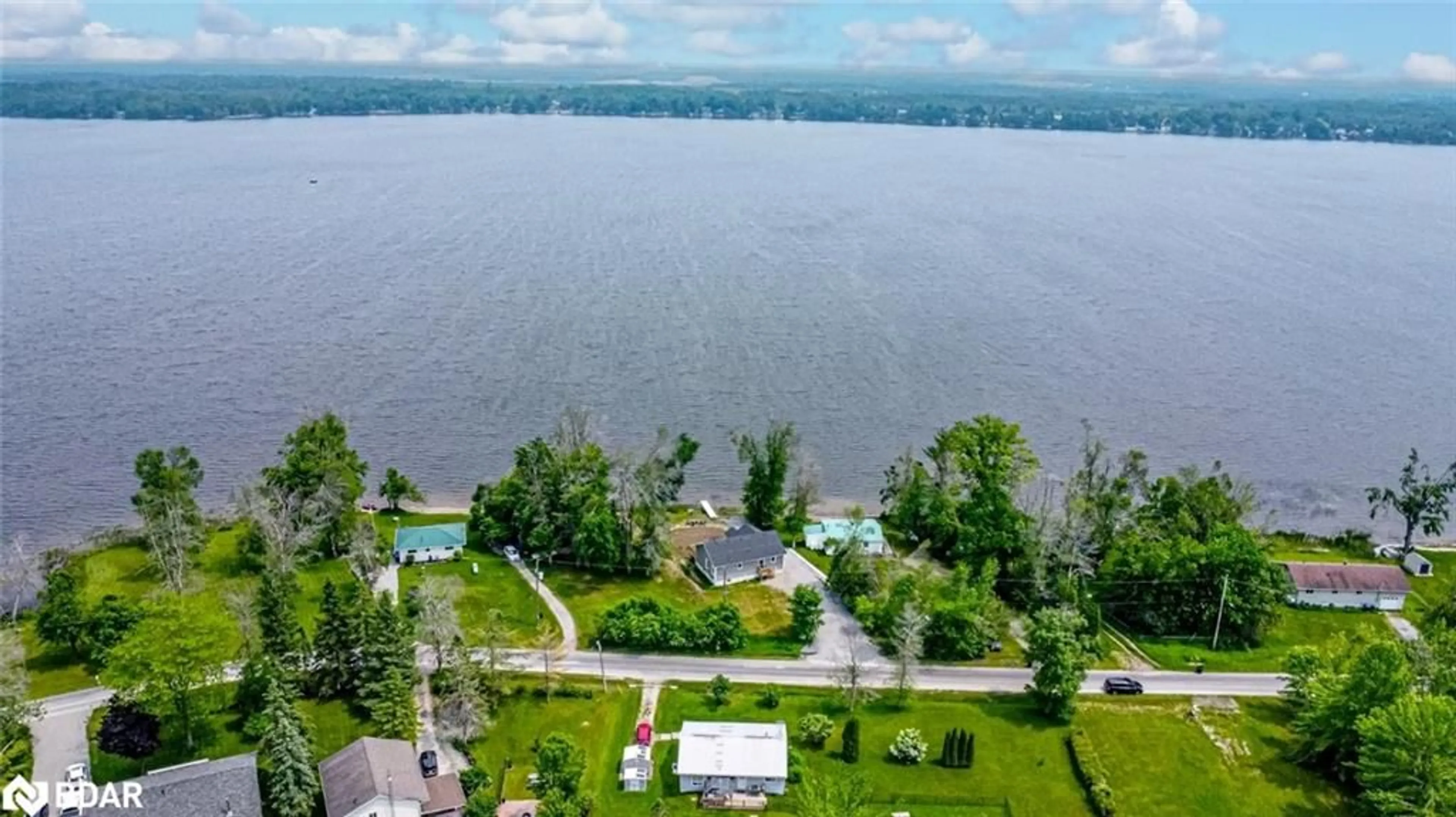 A pic from outside/outdoor area/front of a property/back of a property/a pic from drone, water/lake/river/ocean view for 4097 Dalrymple Dr, Ramara Ontario L0K 1B0