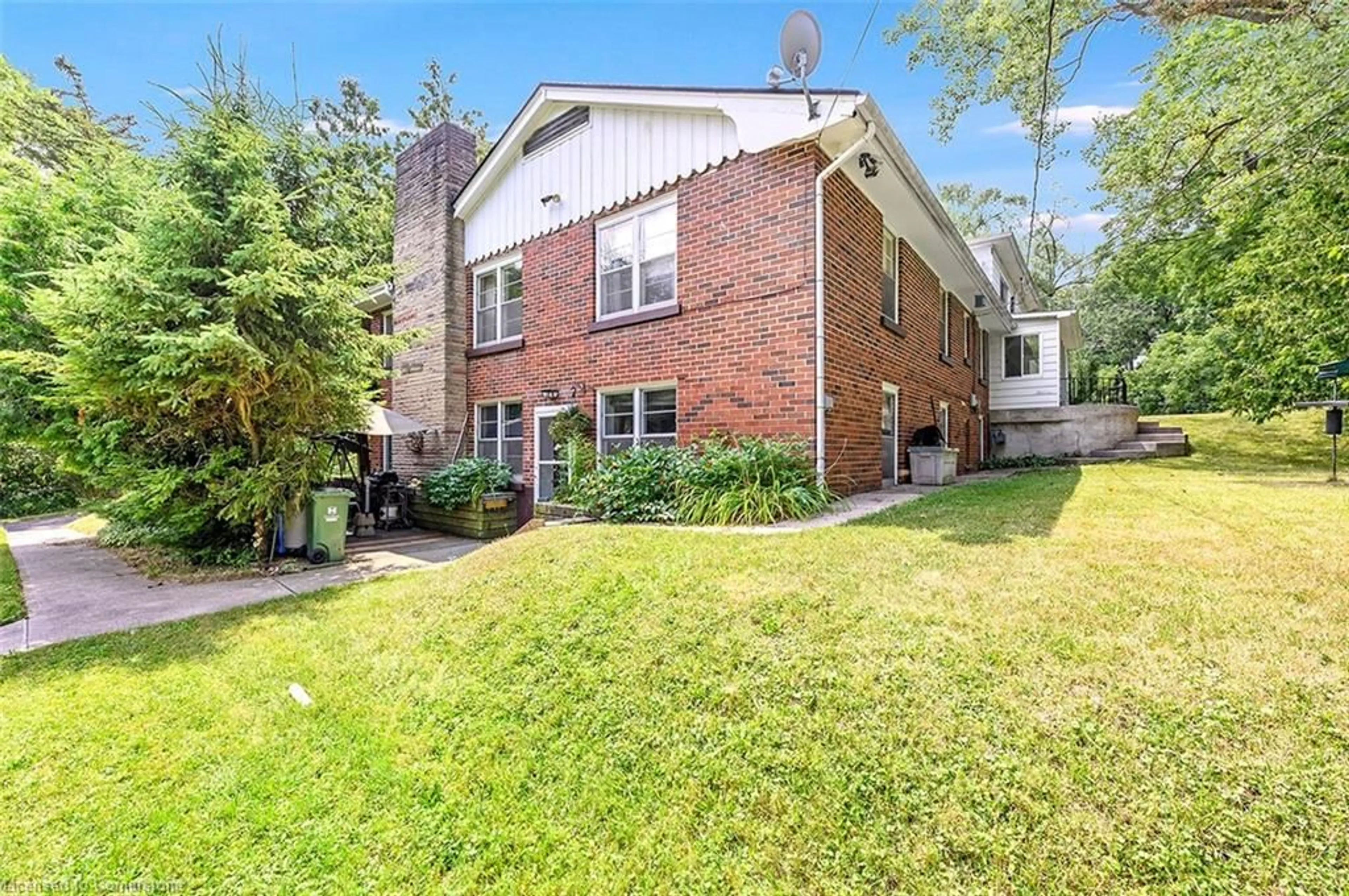 Home with brick exterior material, street for 18 Sullivan's Lane, Dundas Ontario L9H 5N7