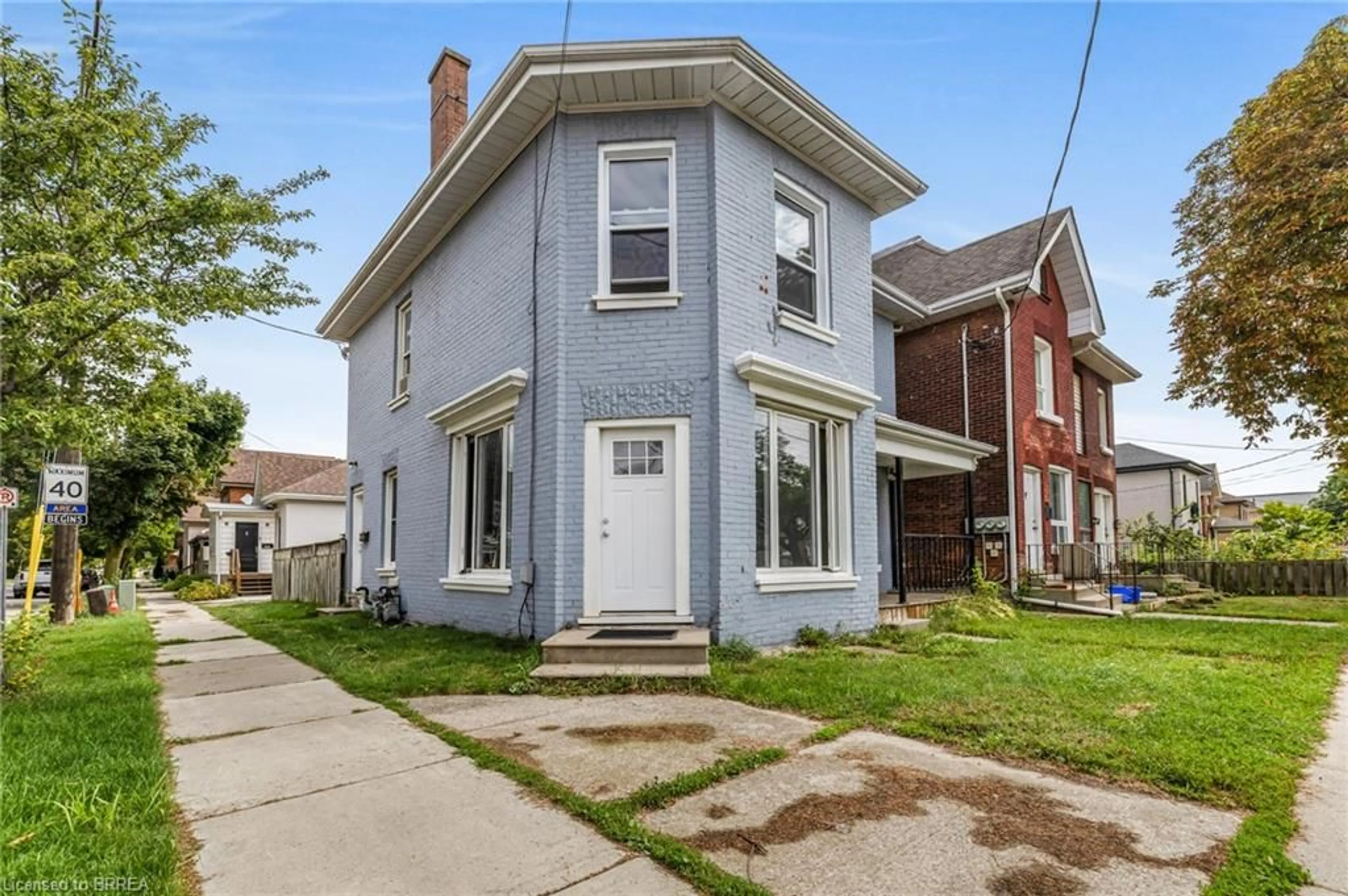 Home with brick exterior material, street for 74 Erie Ave, Brantford Ontario N3S 2E9