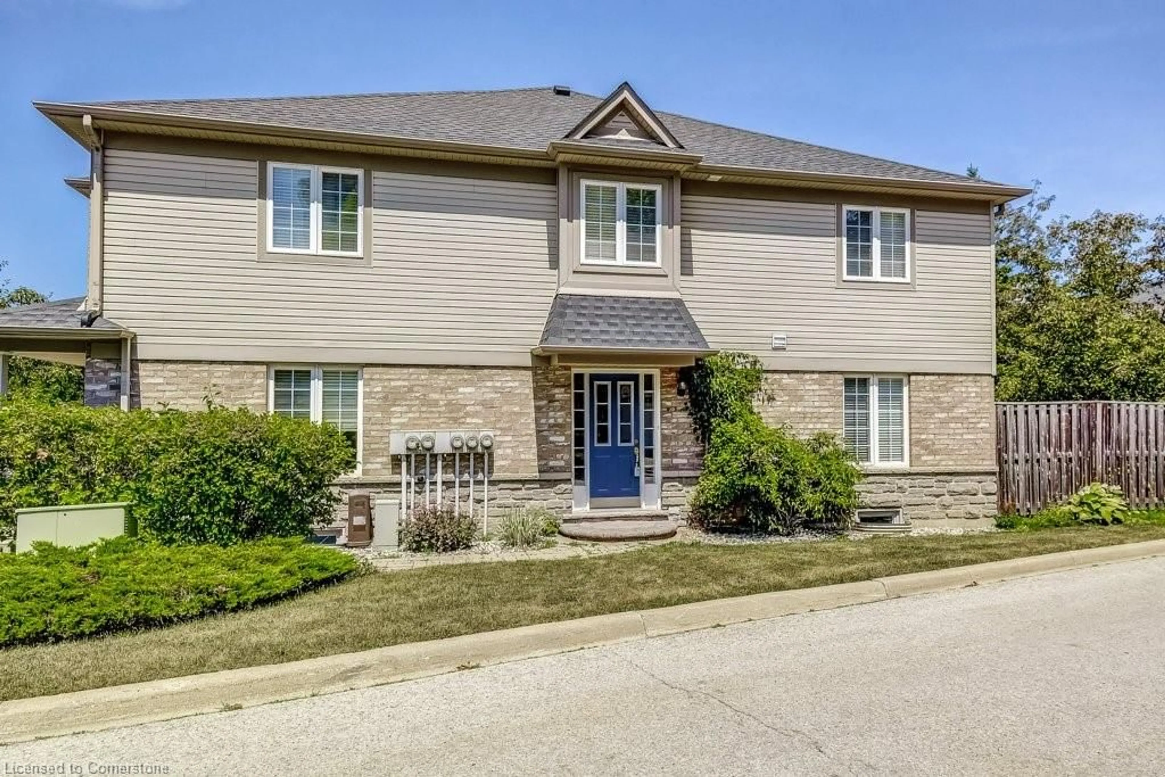 Home with brick exterior material, street for 7 Southside Pl #57, Hamilton Ontario L9C 7W6