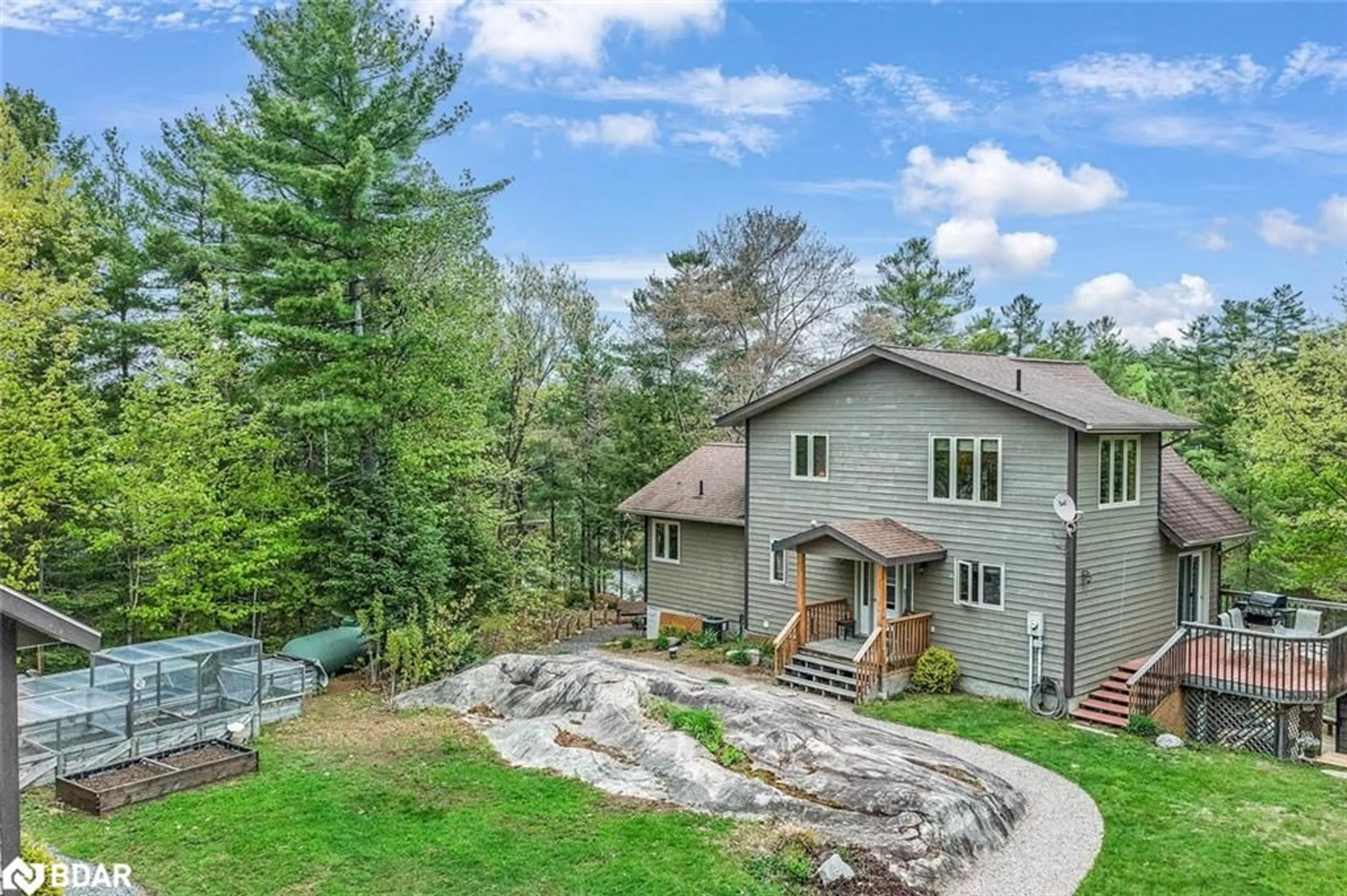 A pic from outside/outdoor area/front of a property/back of a property/a pic from drone, mountain view for 46 James Rider Rd, Nobel Ontario P0G 1G0