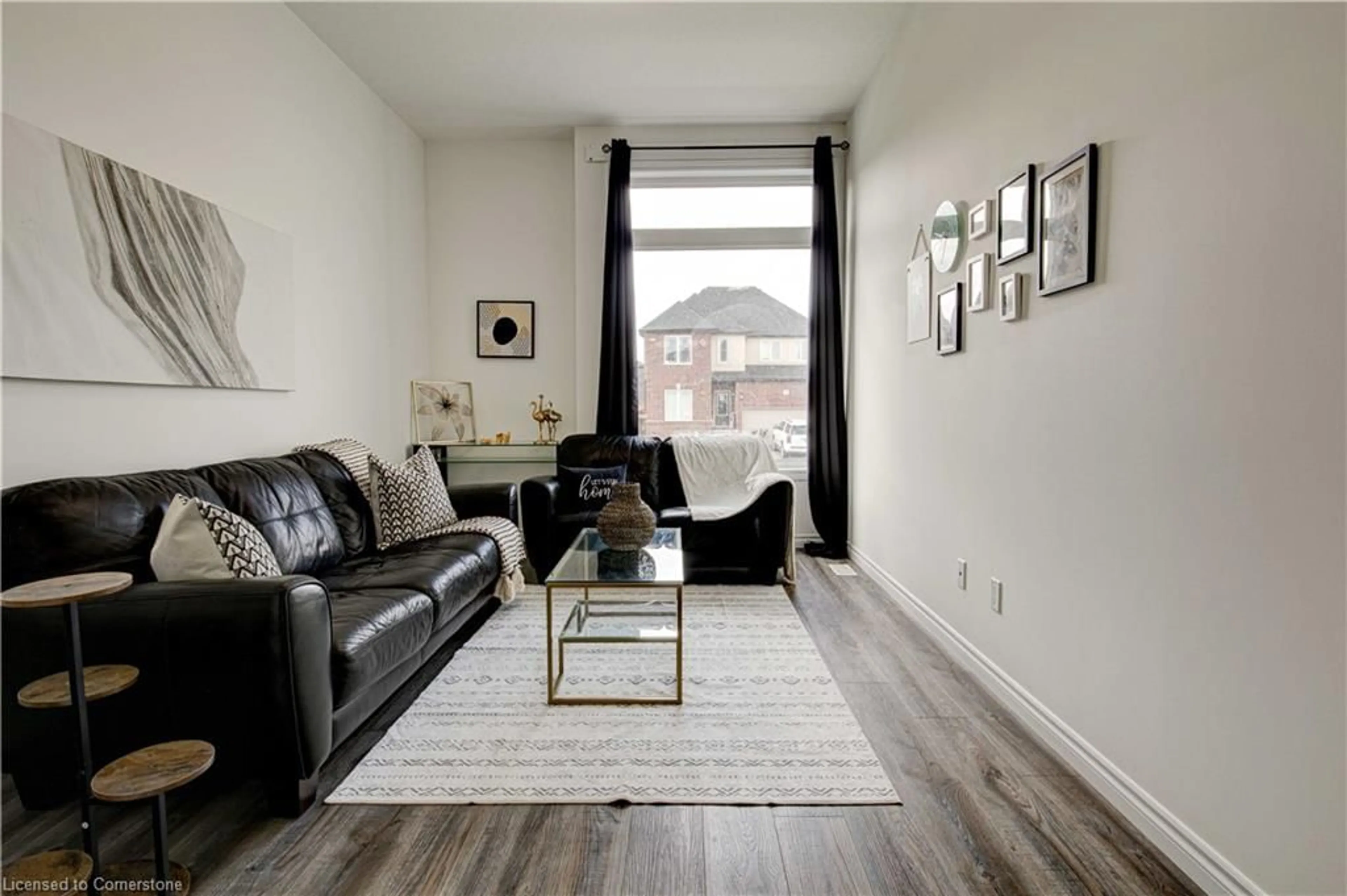 Living room with furniture, wood/laminate floor for 28 Sass Cres, Paris Ontario N3L 0E9