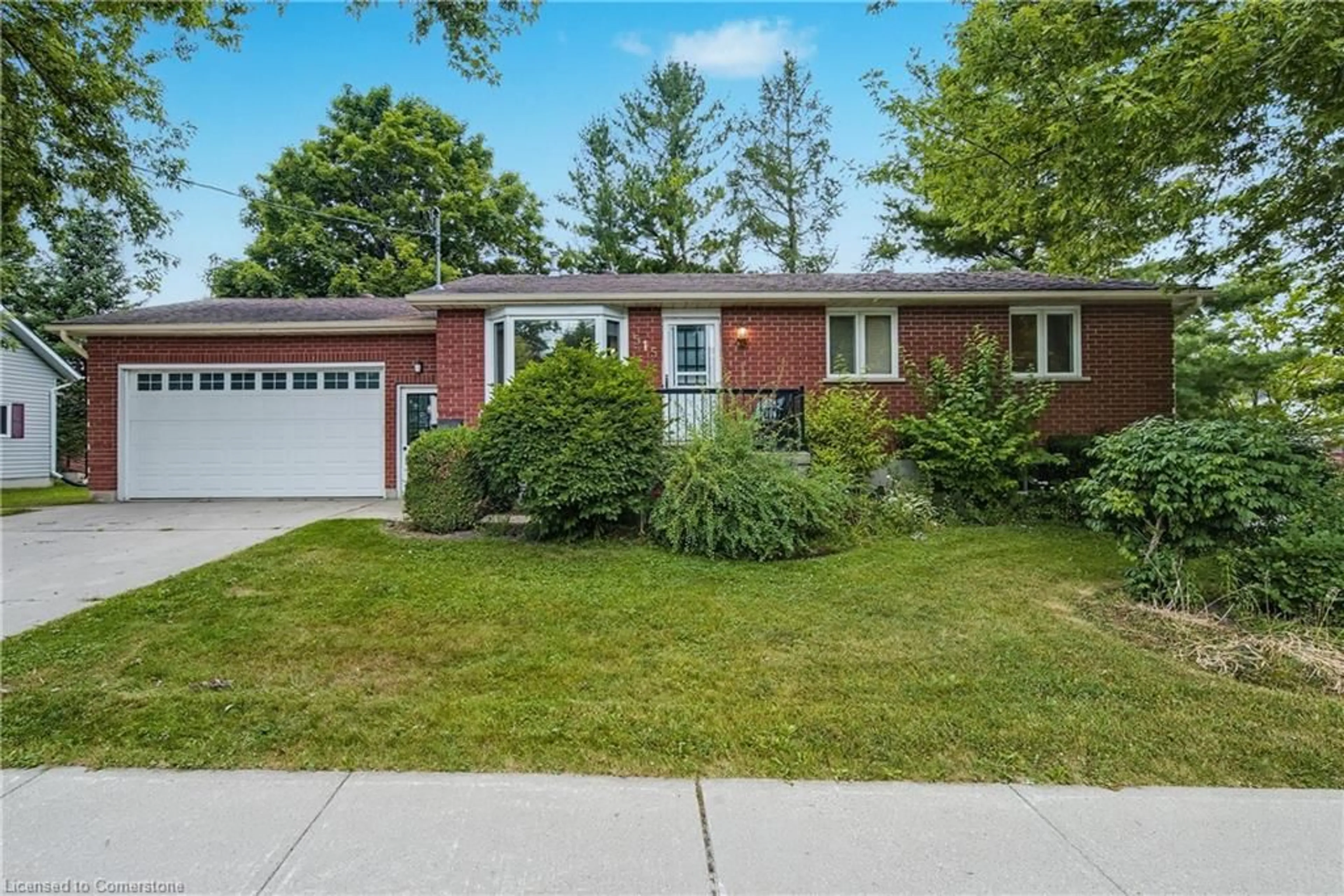 Home with brick exterior material, street for 515 Elm Ave, Listowel Ontario N4W 3G3