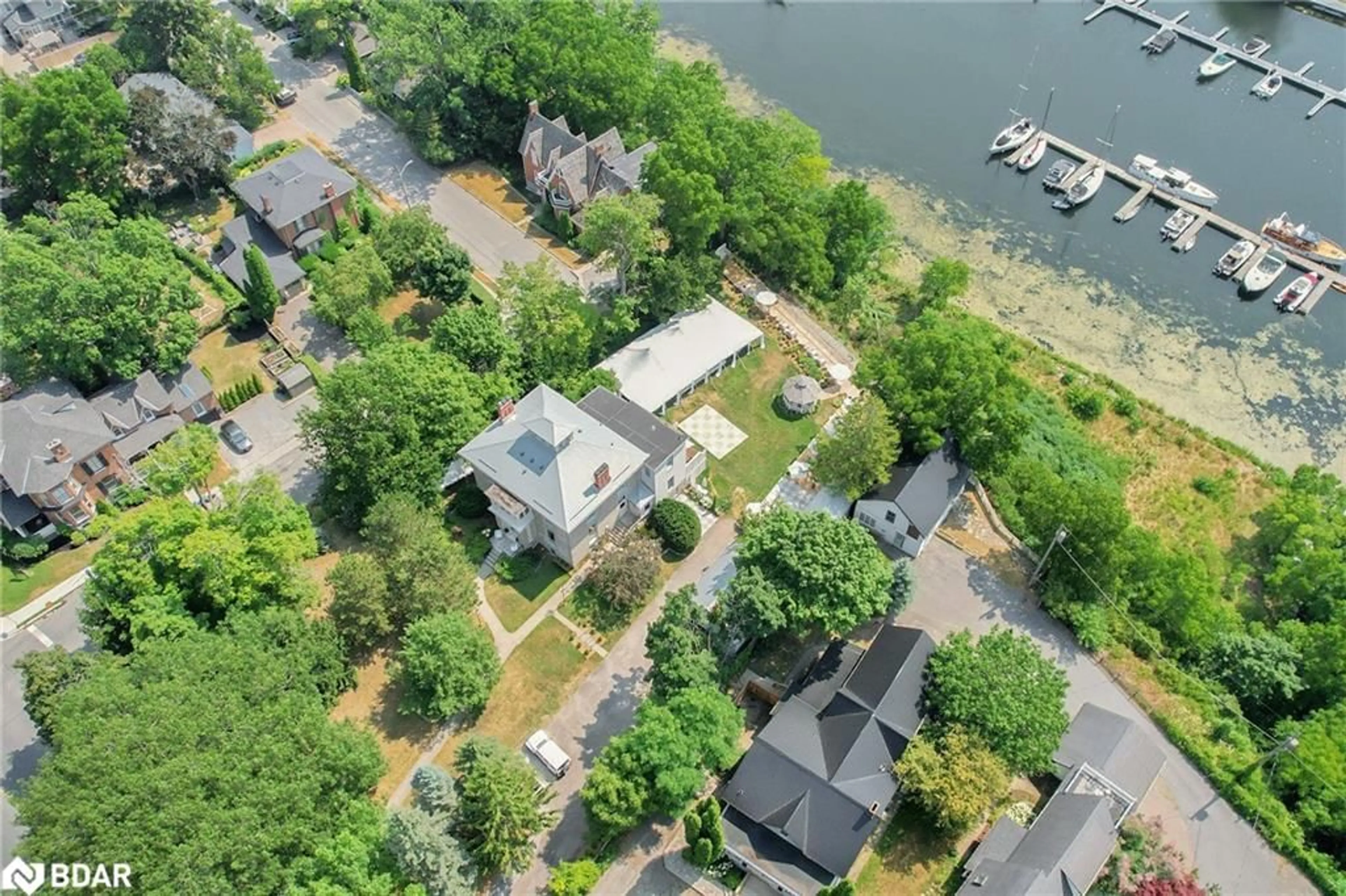 A pic from outside/outdoor area/front of a property/back of a property/a pic from drone, water/lake/river/ocean view for 346 Picton Main St, Picton Ontario K0K 2T0
