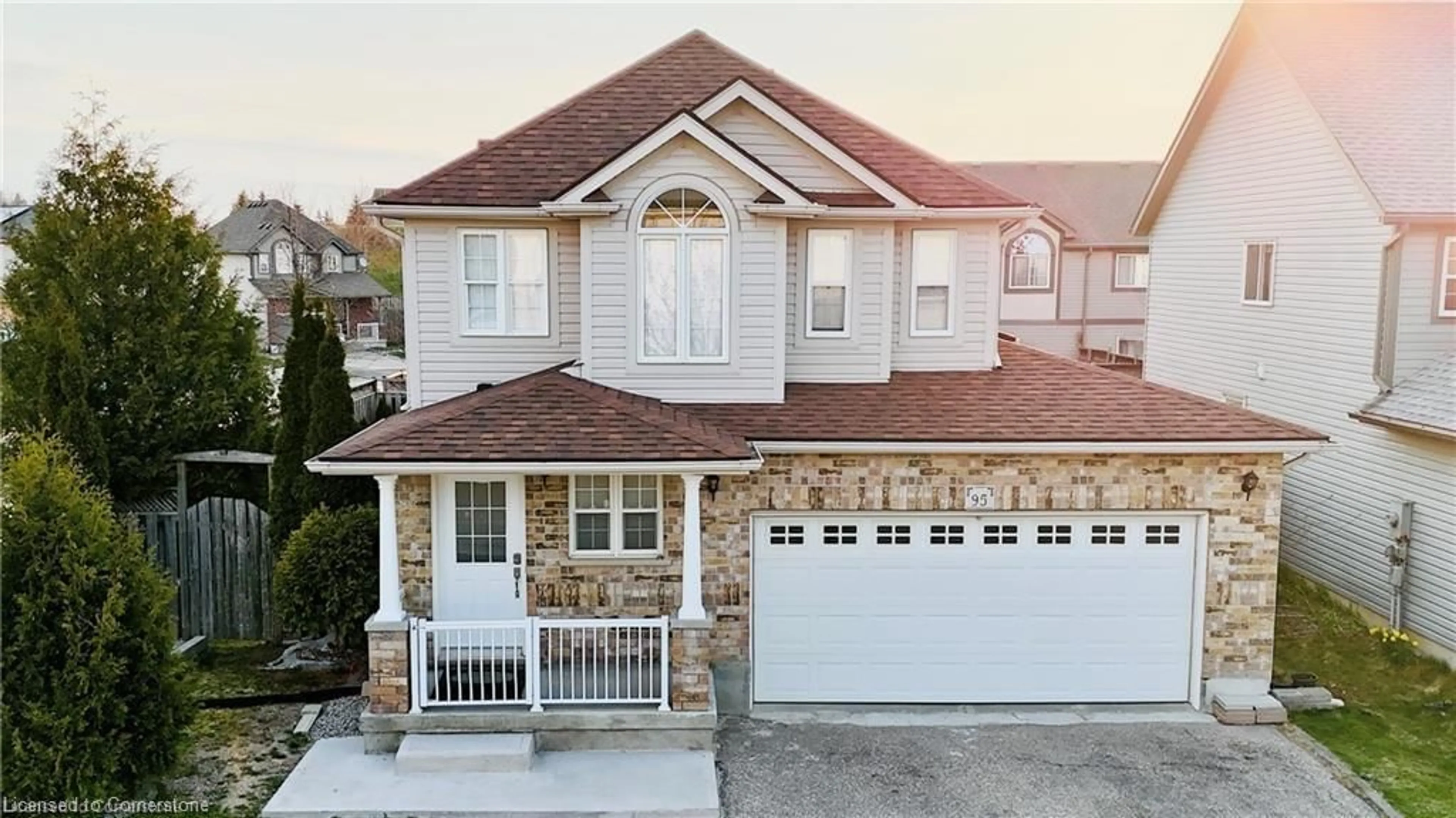 Home with vinyl exterior material, street for 95 Indigo St, Kitchener Ontario N2E 4E5